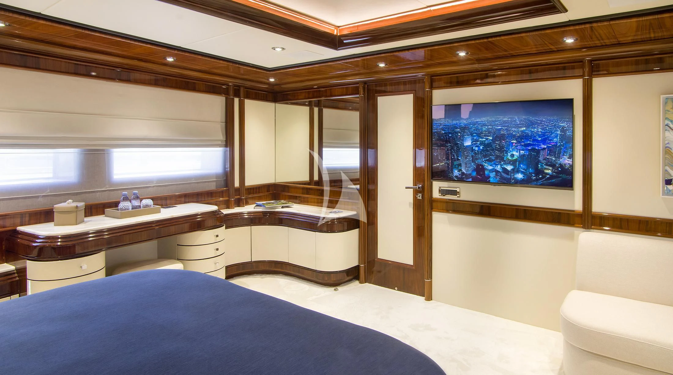a room with a bed and a desk aboard JAAN Yacht for Sale