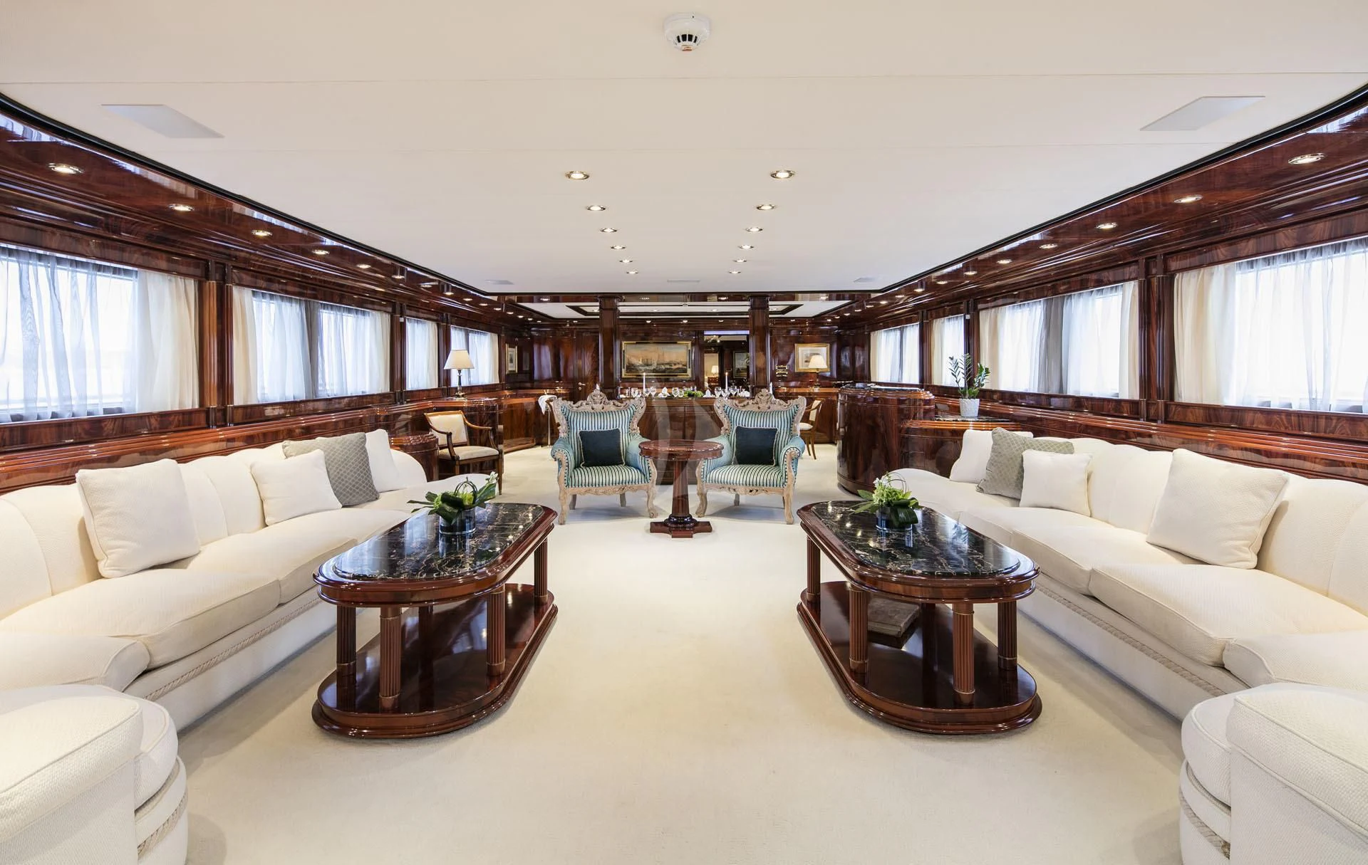 a living room with a couch and a coffee table aboard JAAN Yacht for Sale