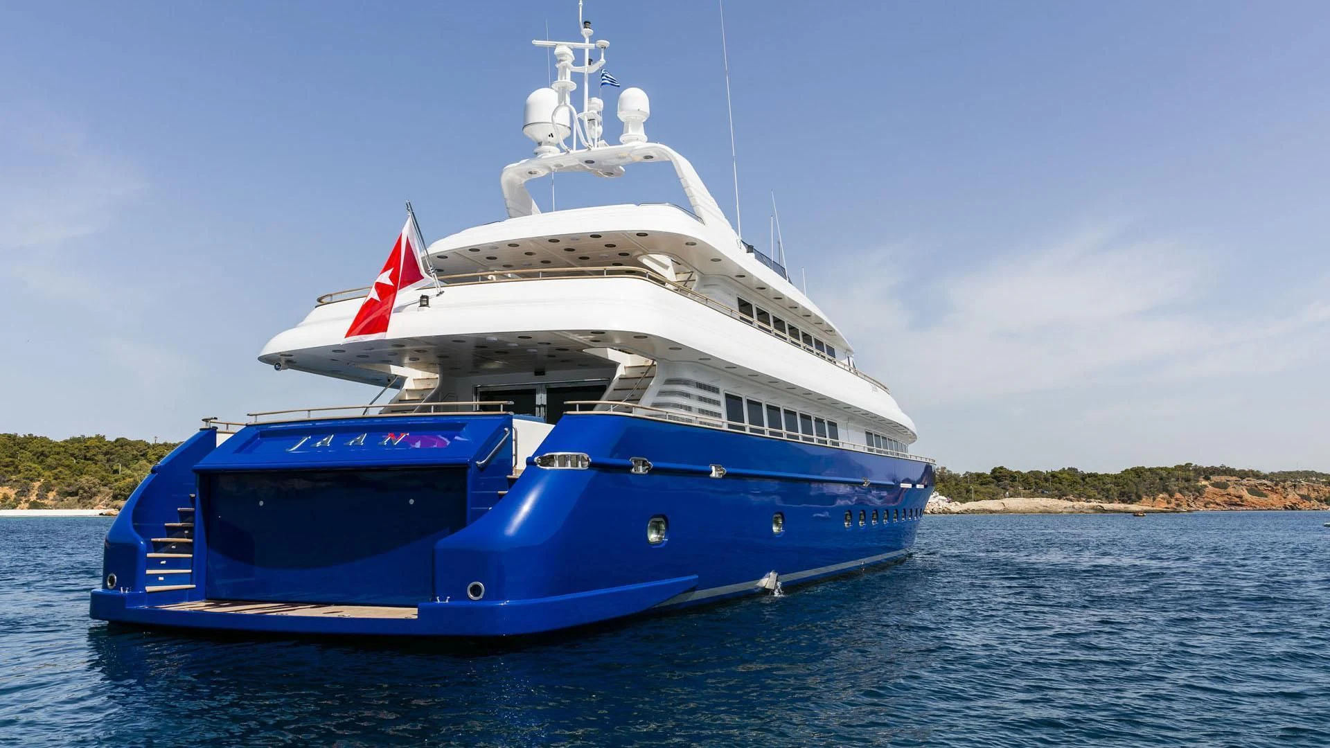 a large blue and white boat aboard JAAN Yacht for Sale