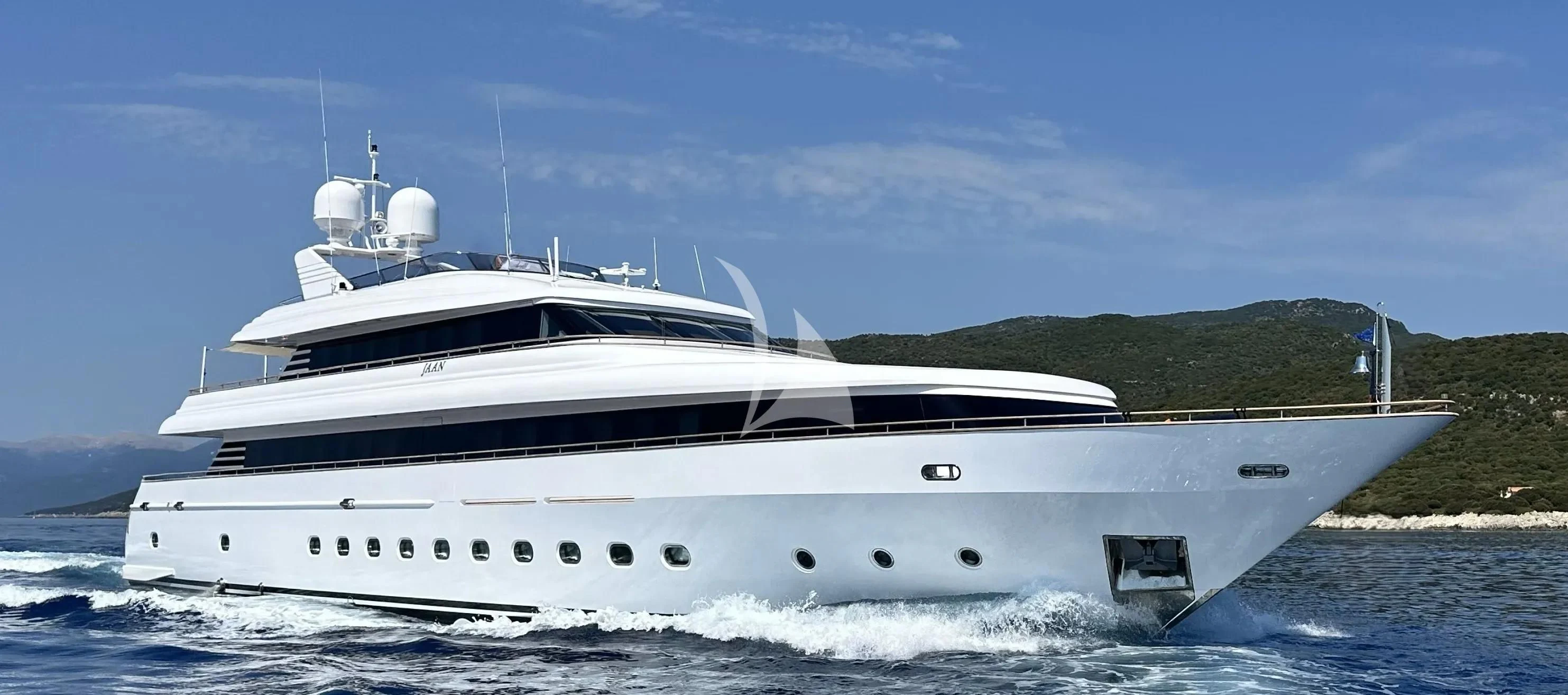 a white yacht on the water aboard JAAN Yacht for Sale