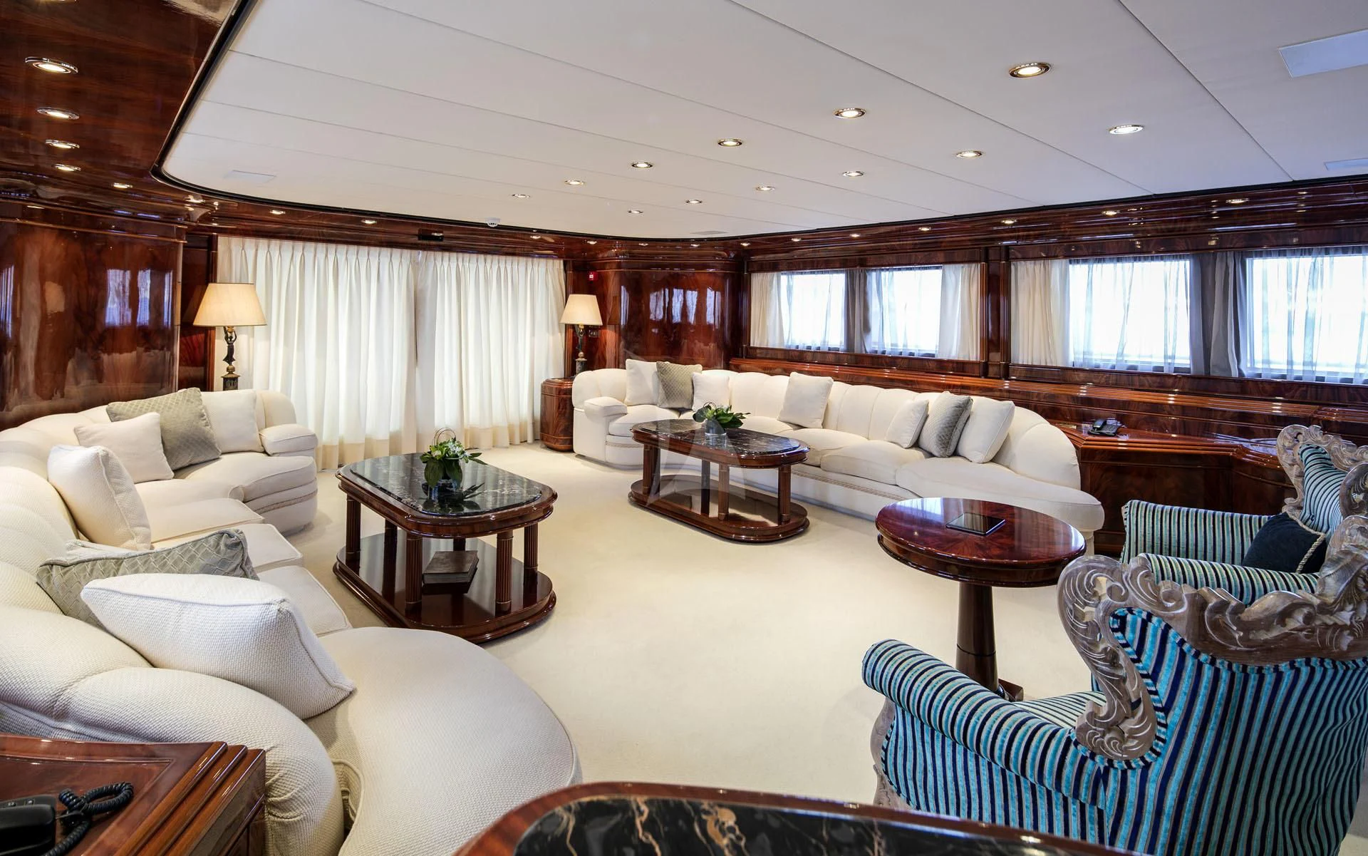 a living room with a large window aboard JAAN Yacht for Sale