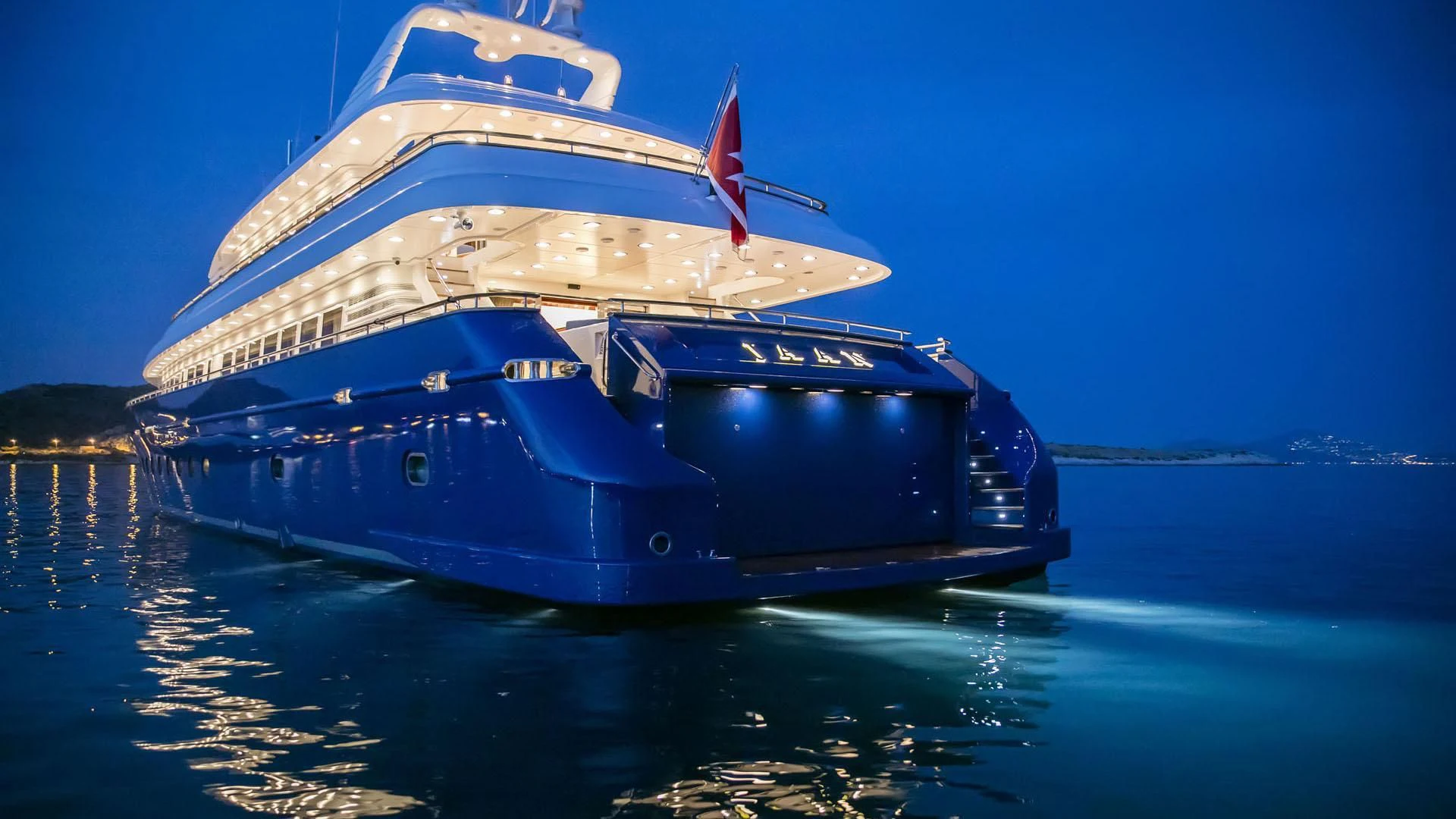 a large cruise ship in the water aboard JAAN Yacht for Sale