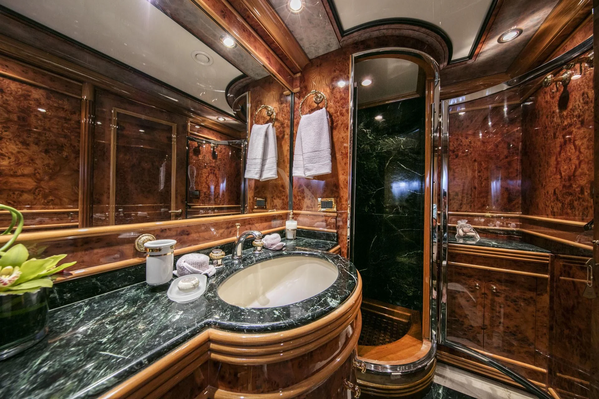 a bathroom with a large mirror aboard JAAN Yacht for Sale