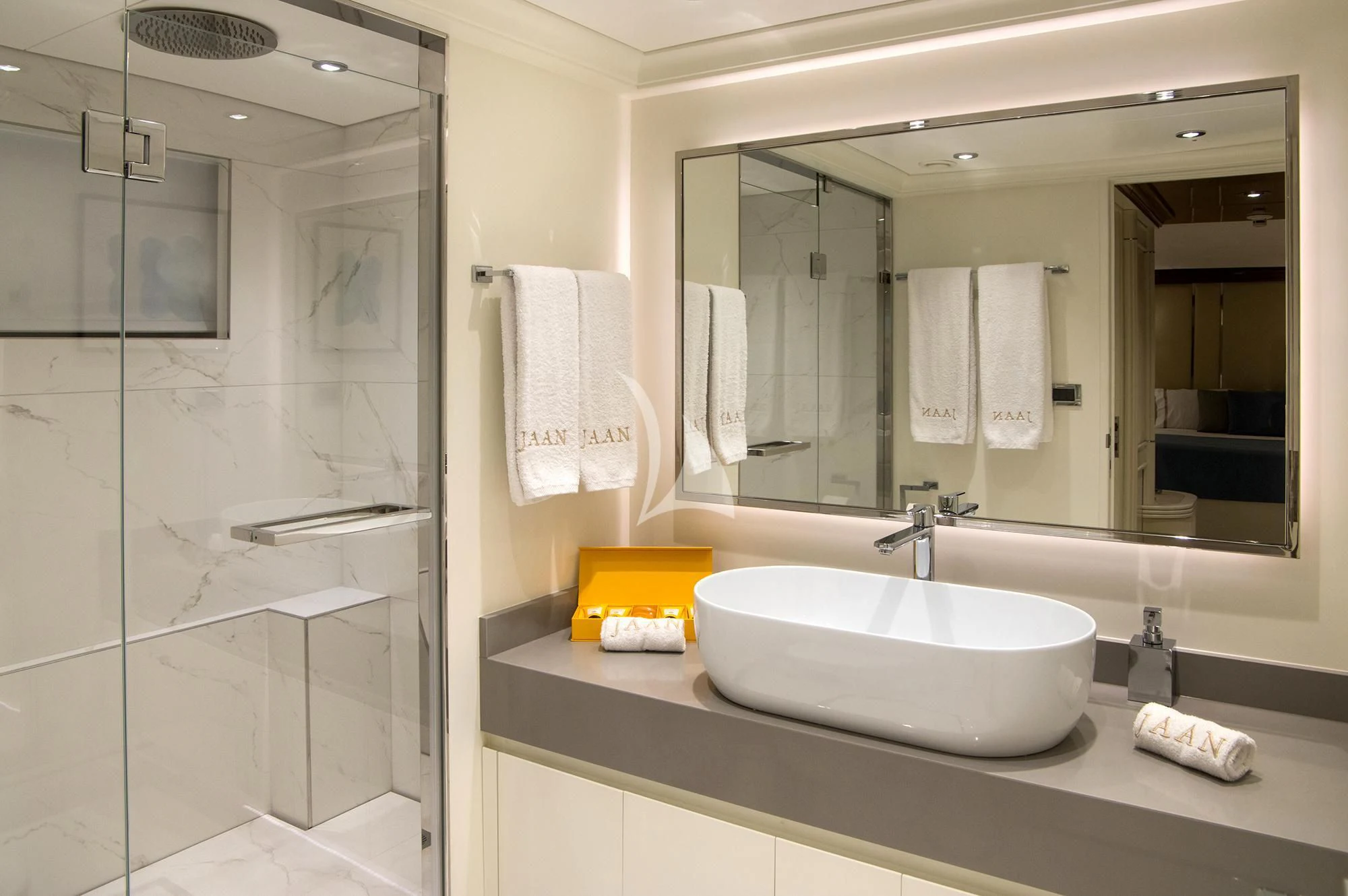 a bathroom with a sink and a mirror aboard JAAN Yacht for Sale