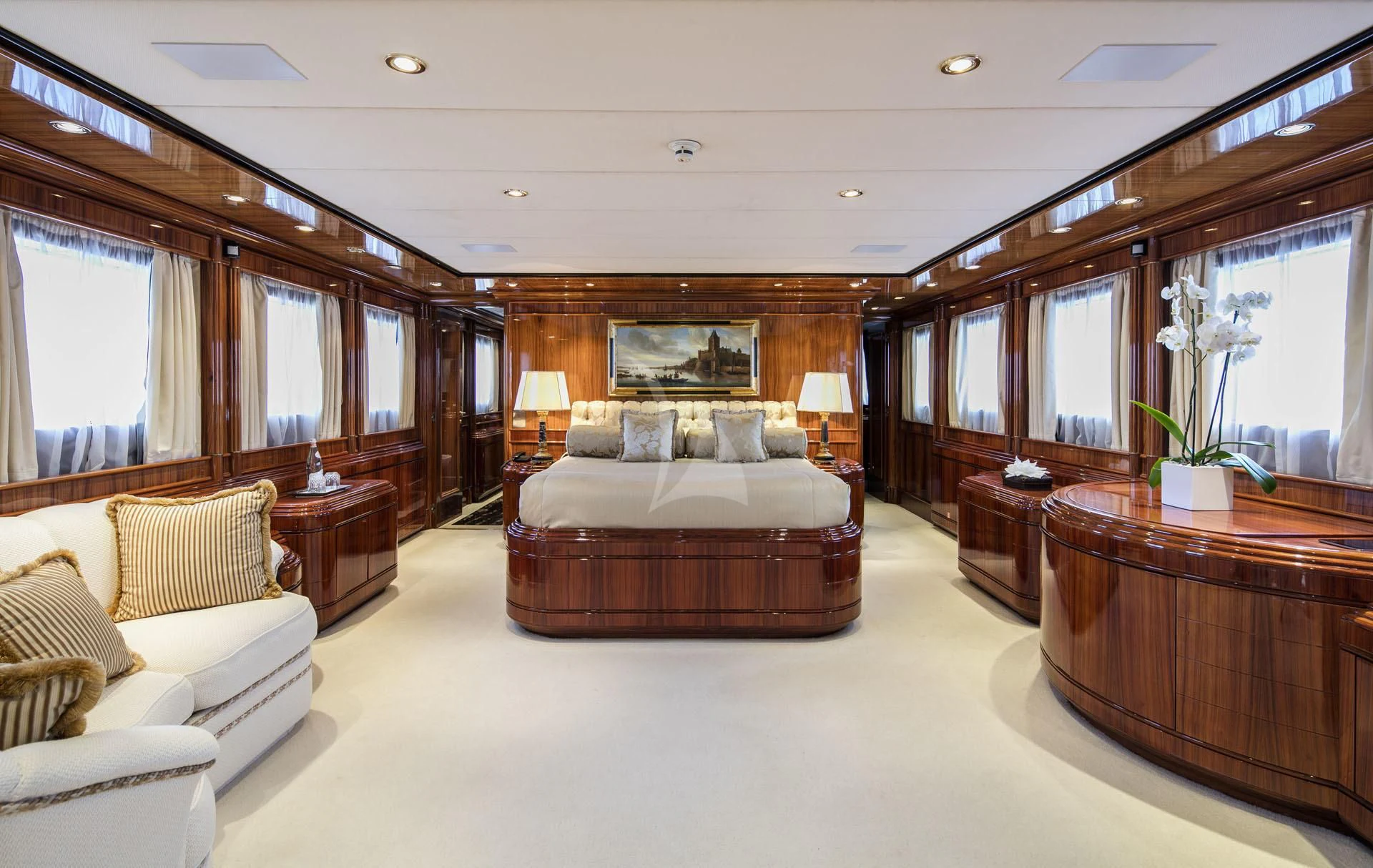 a large living room with a large mirror aboard JAAN Yacht for Sale