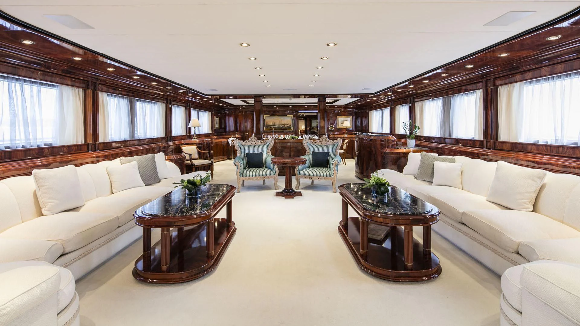 a living room with a couch and a coffee table aboard JAAN Yacht for Sale