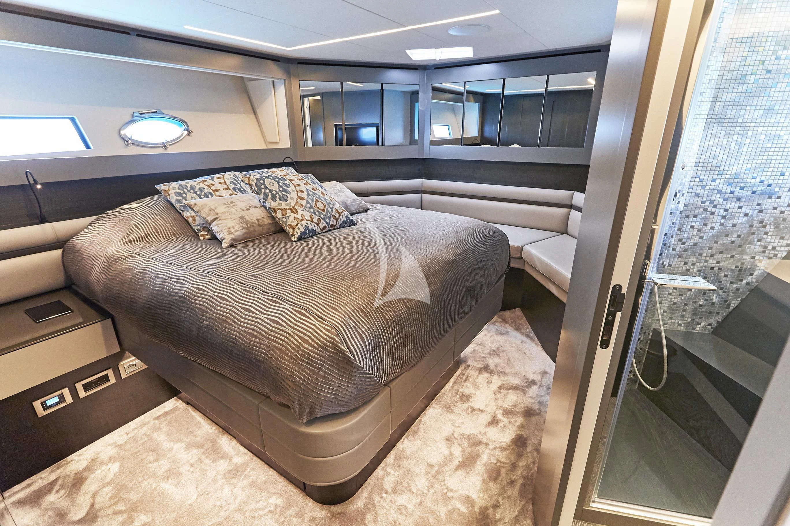 a bed in a room aboard BALOO III Yacht for Sale