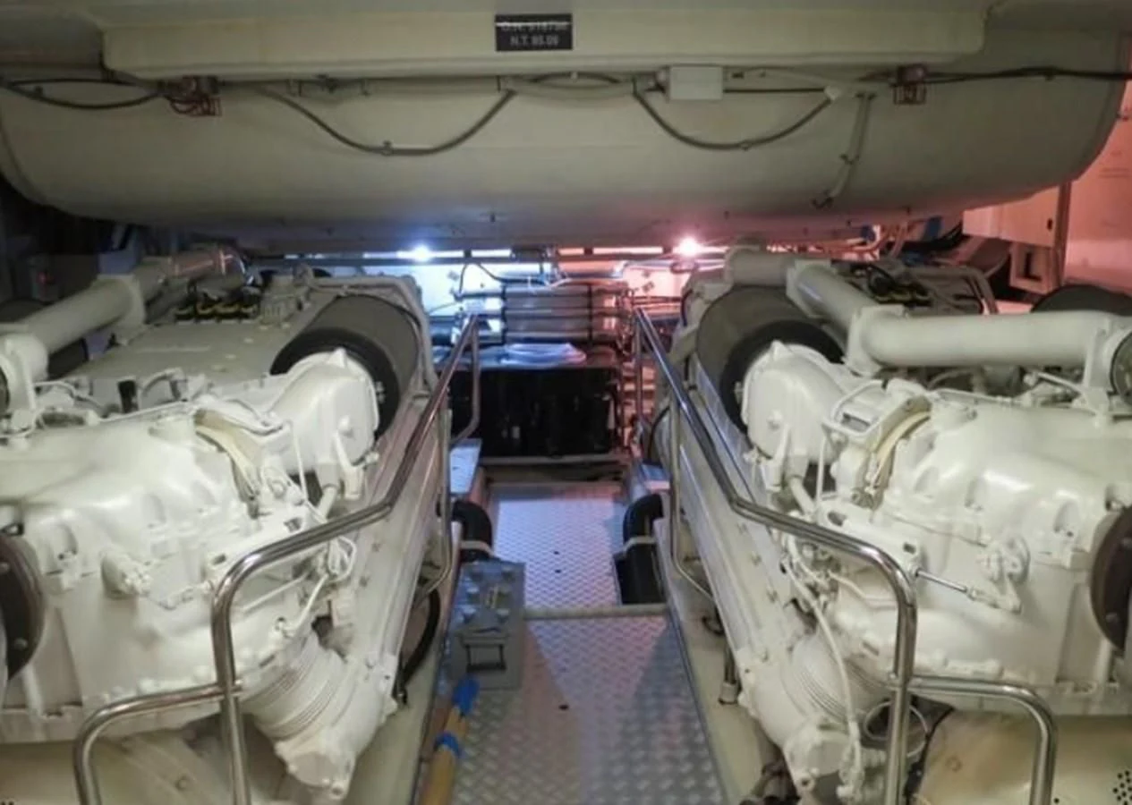 a large room with white machines aboard RIVA 86 DOMINO Yacht for Sale