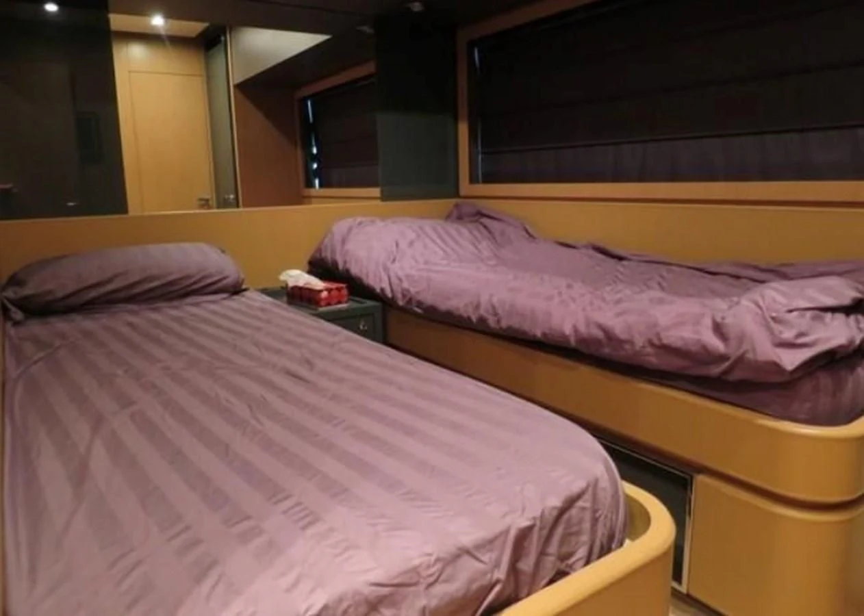 a couple of beds in a room aboard RIVA 86 DOMINO Yacht for Sale
