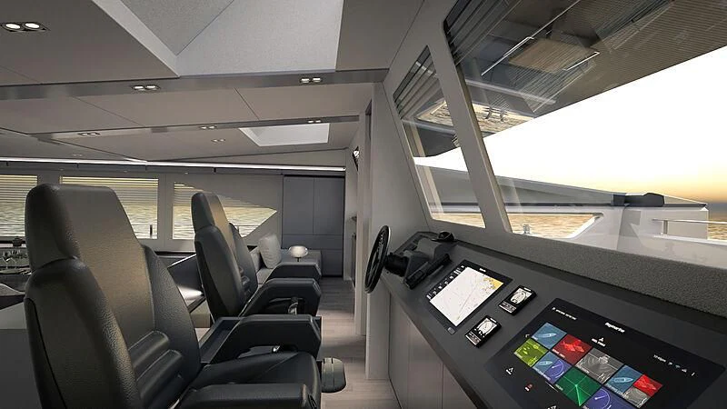 inside of a vehicle with a desk and computer screens aboard AMANTIS 7 Yacht for Sale