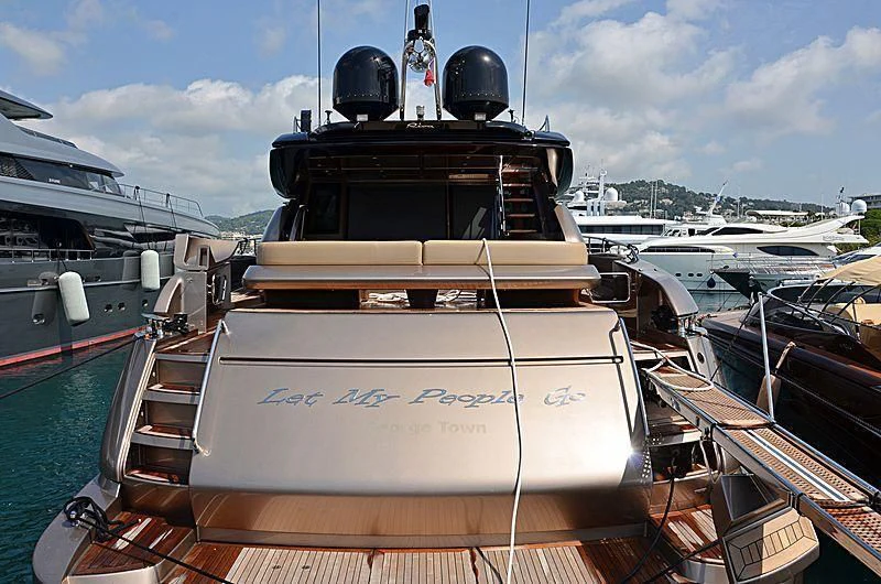 a boat is parked in a harbor aboard LET MY PEOPLE GO Yacht for Sale