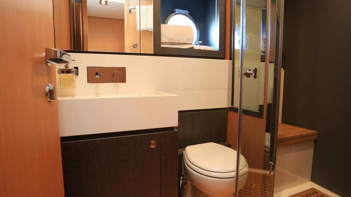 a bathroom with a glass shower aboard LET MY PEOPLE GO Yacht for Sale