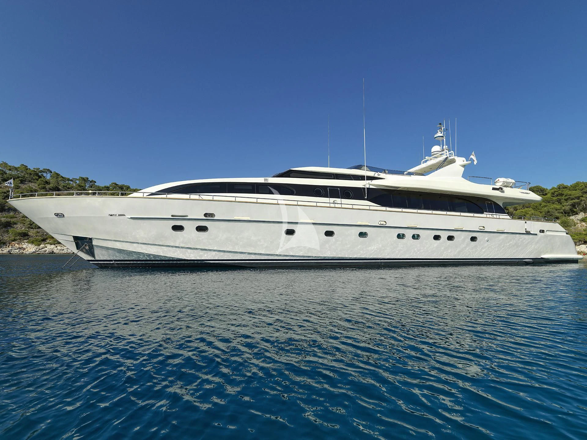 a white yacht in the water aboard SANSARA Yacht for Sale