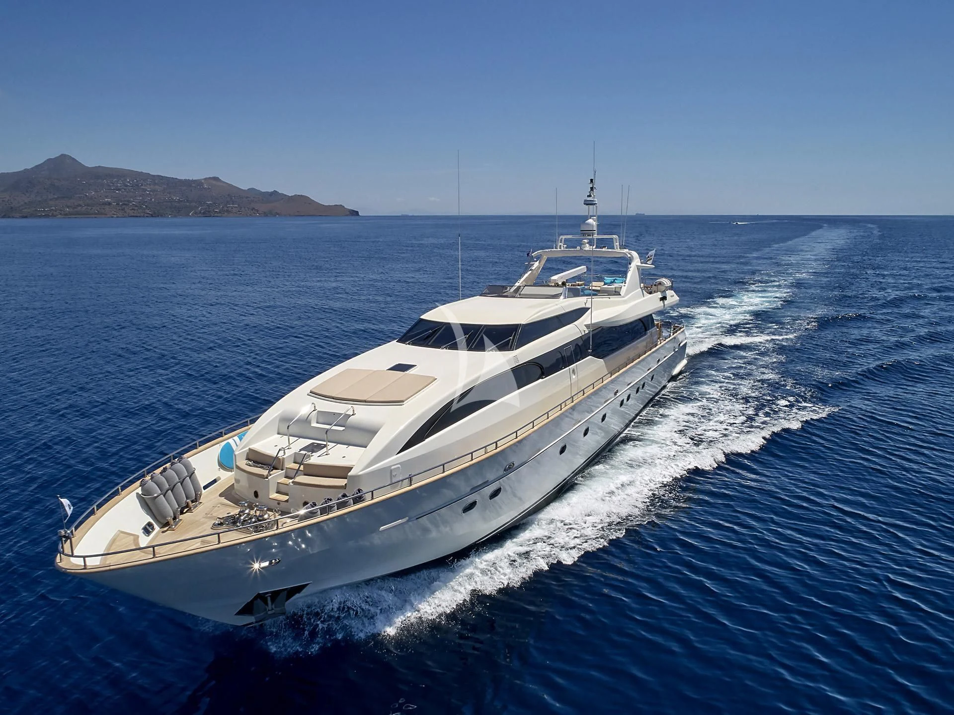 a white yacht on the water aboard SANSARA Yacht for Sale