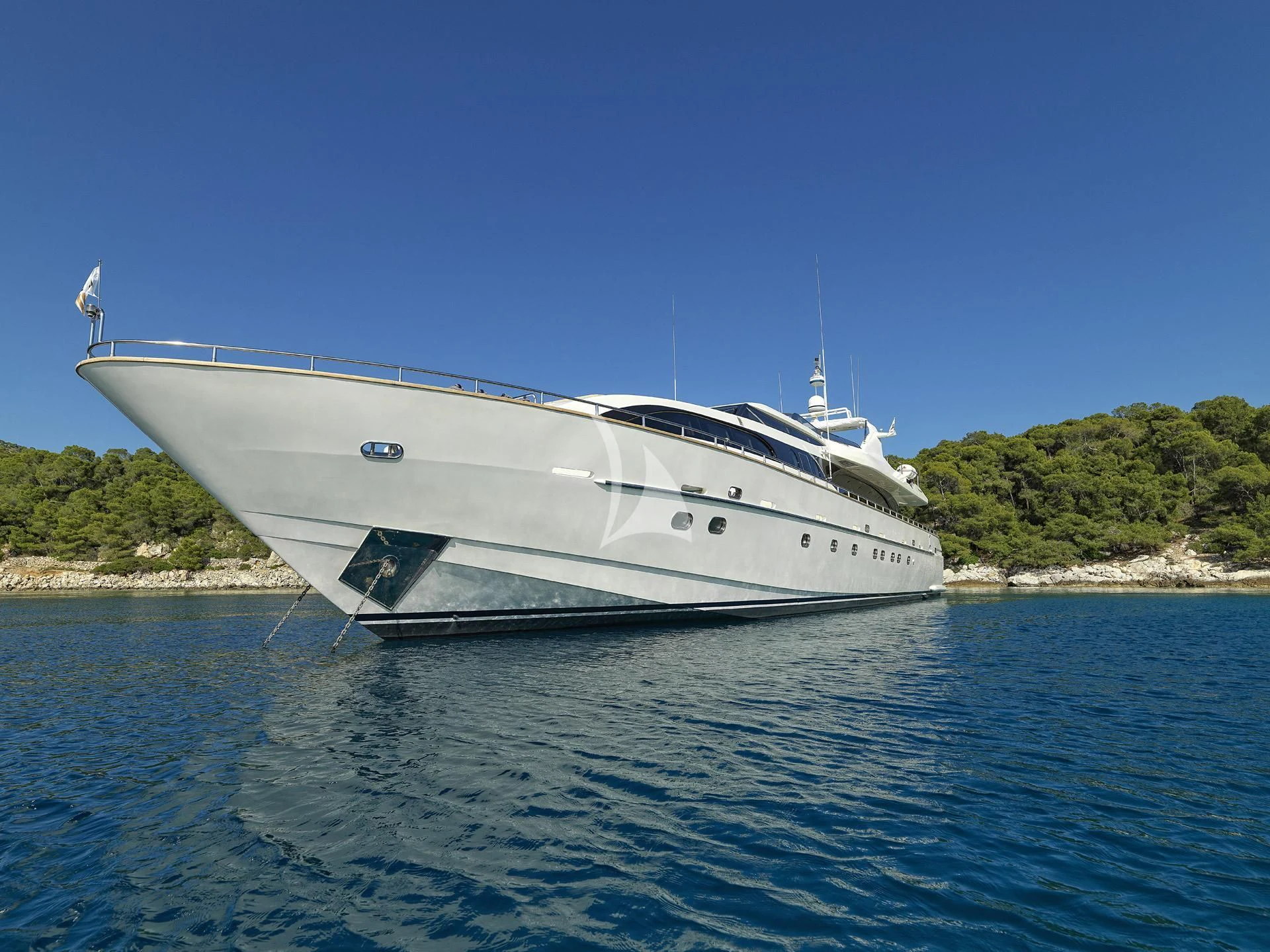 a white boat on the water aboard SANSARA Yacht for Sale