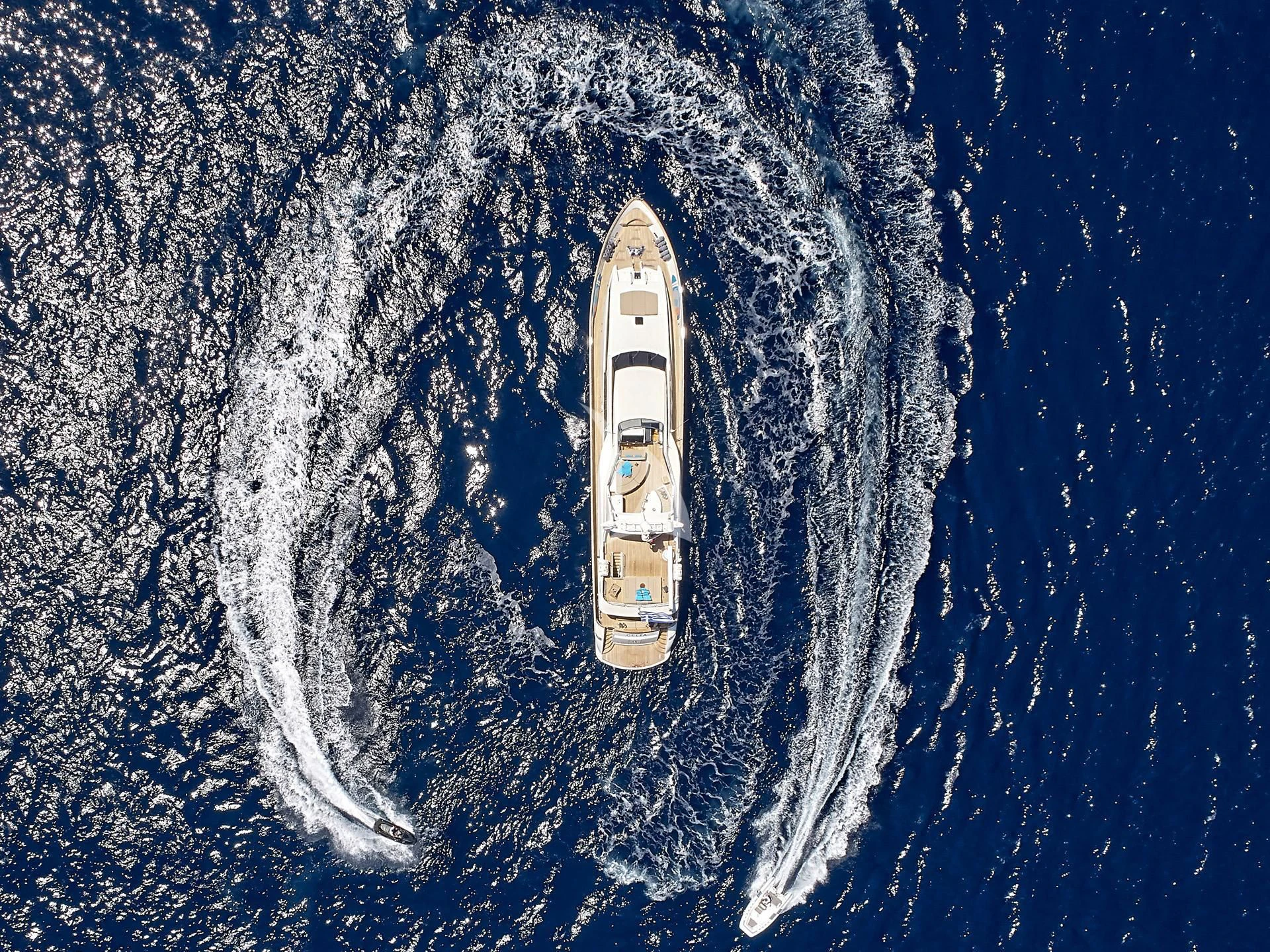 a space shuttle flying over a body of water aboard SANSARA Yacht for Sale