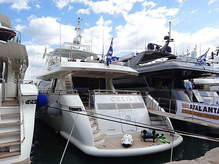 a boat docked at a pier aboard SANSARA Yacht for Sale