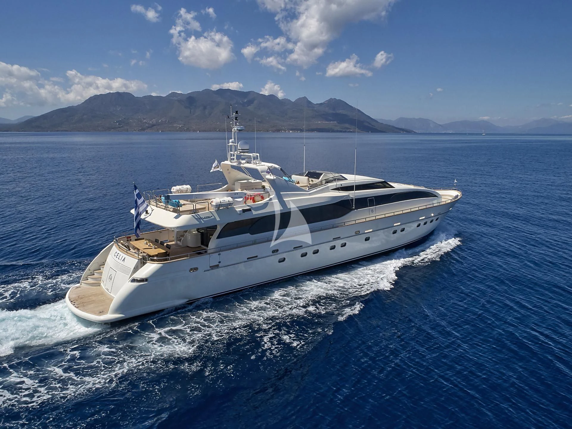 a white yacht on the water aboard SANSARA Yacht for Sale