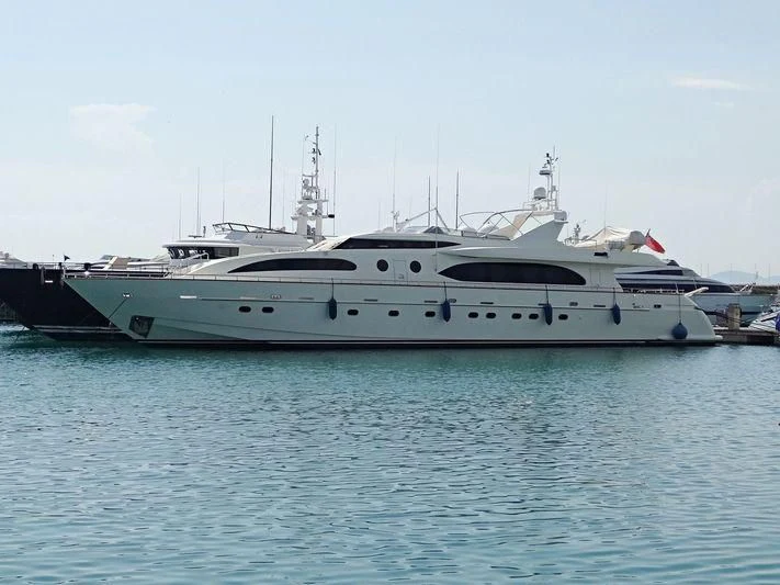 a large white boat in the water aboard SANSARA Yacht for Sale