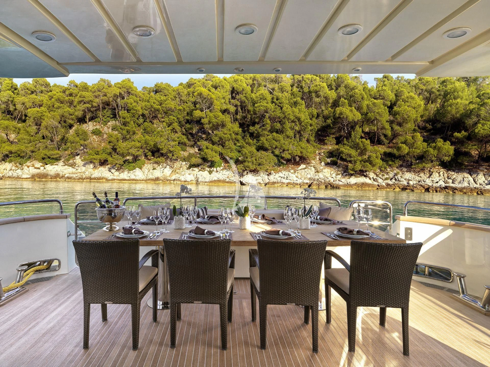 a table set for dinner aboard SANSARA Yacht for Sale