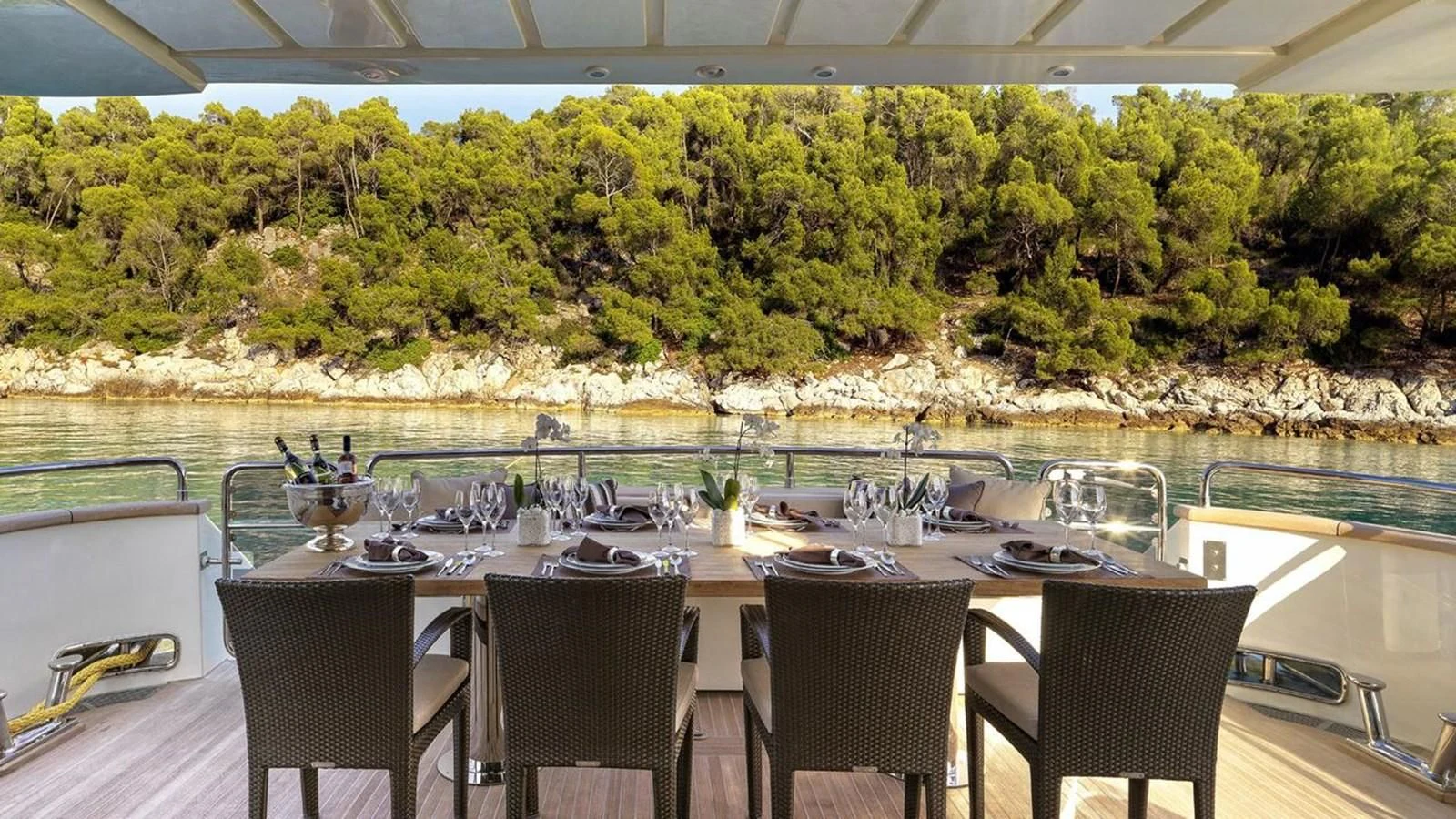 a table set for a meal aboard SANSARA Yacht for Sale