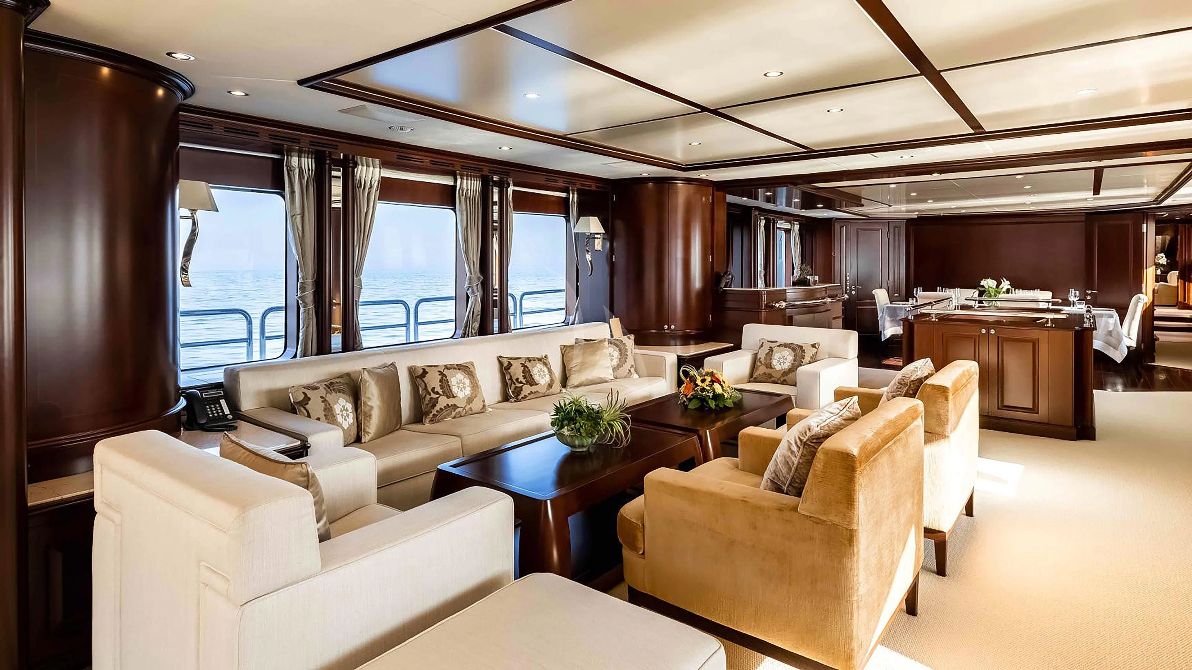a living room with a couch and a table aboard MI AMORE JULIA Yacht for Sale