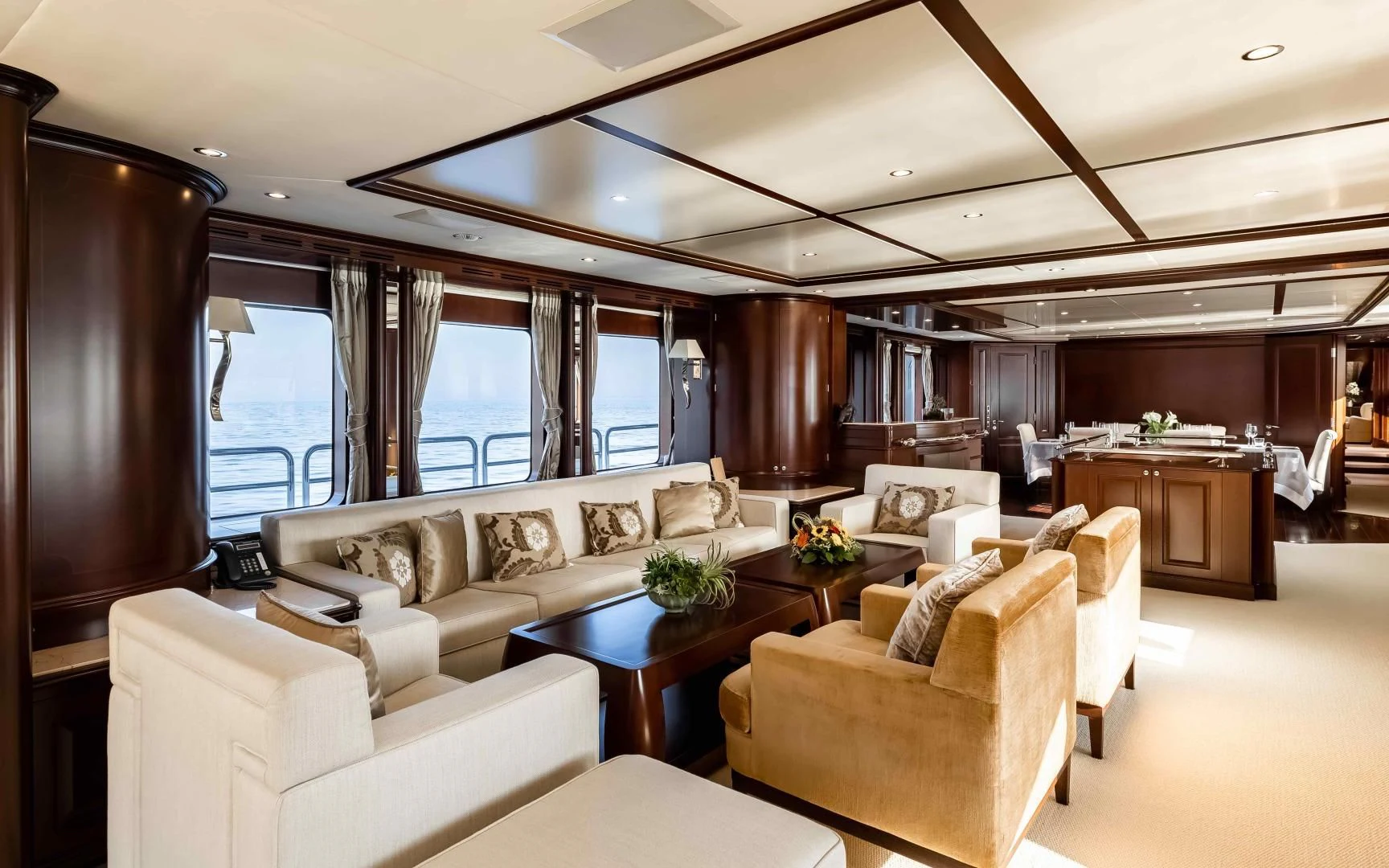 a living room with a couch and a table aboard MI AMORE JULIA Yacht for Sale