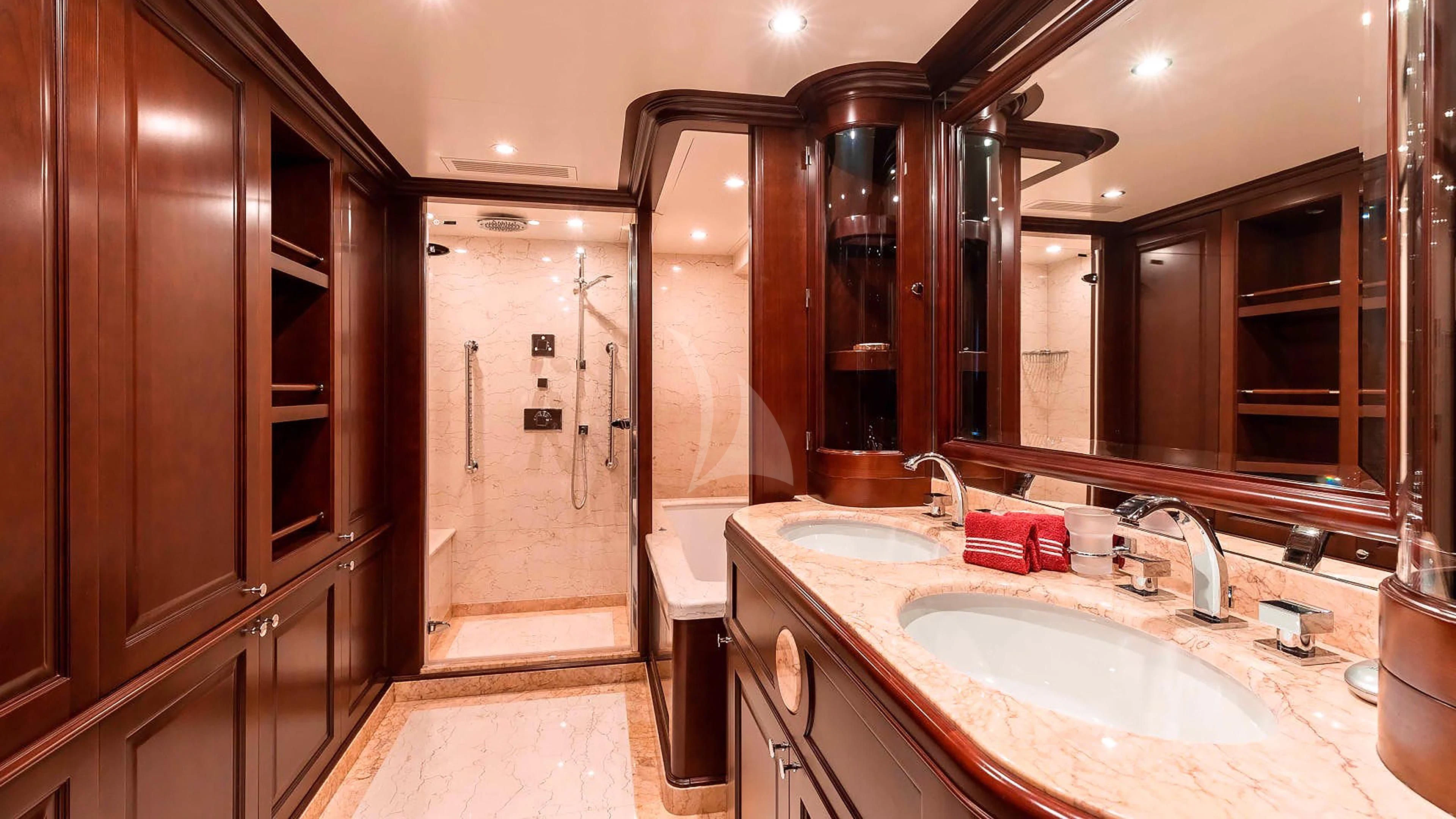 a bathroom with a large mirror aboard MI AMORE JULIA Yacht for Sale