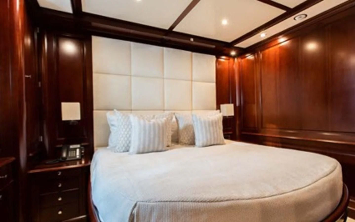 a bed with a white sheet aboard MI AMORE JULIA Yacht for Sale