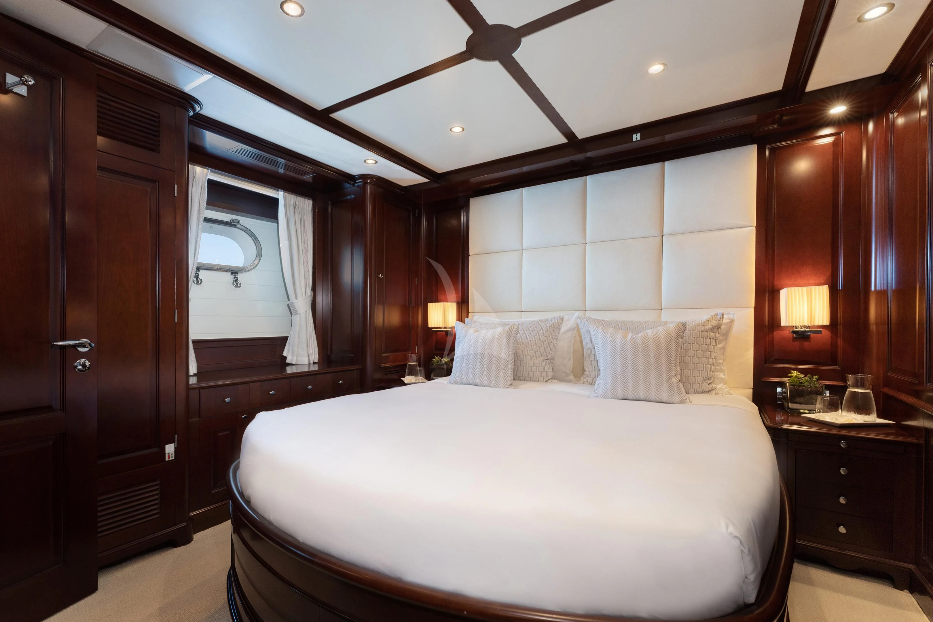 a bedroom with a bed and a closet aboard MI AMORE JULIA Yacht for Sale