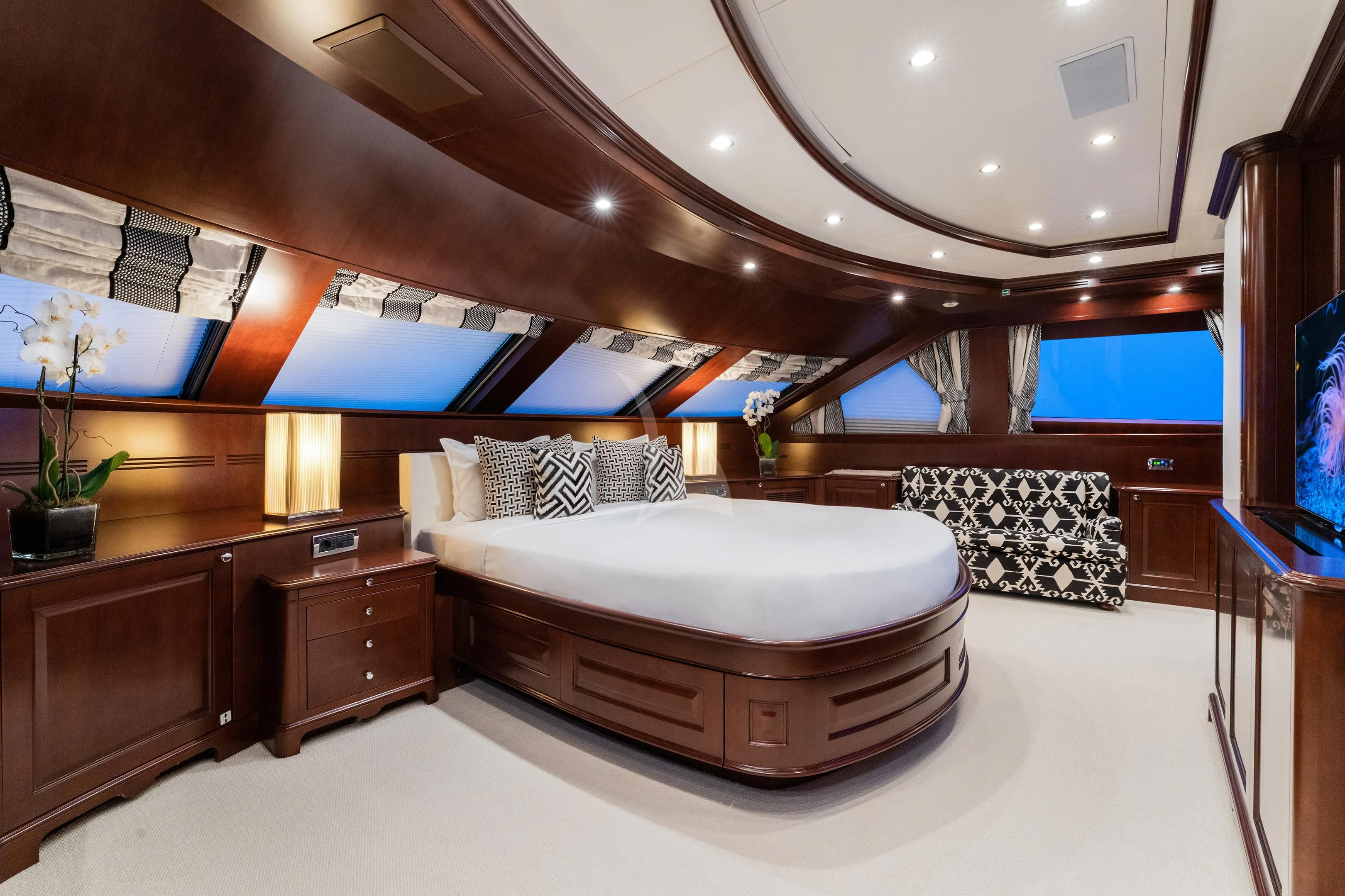 a room with a bed and a desk aboard MI AMORE JULIA Yacht for Sale