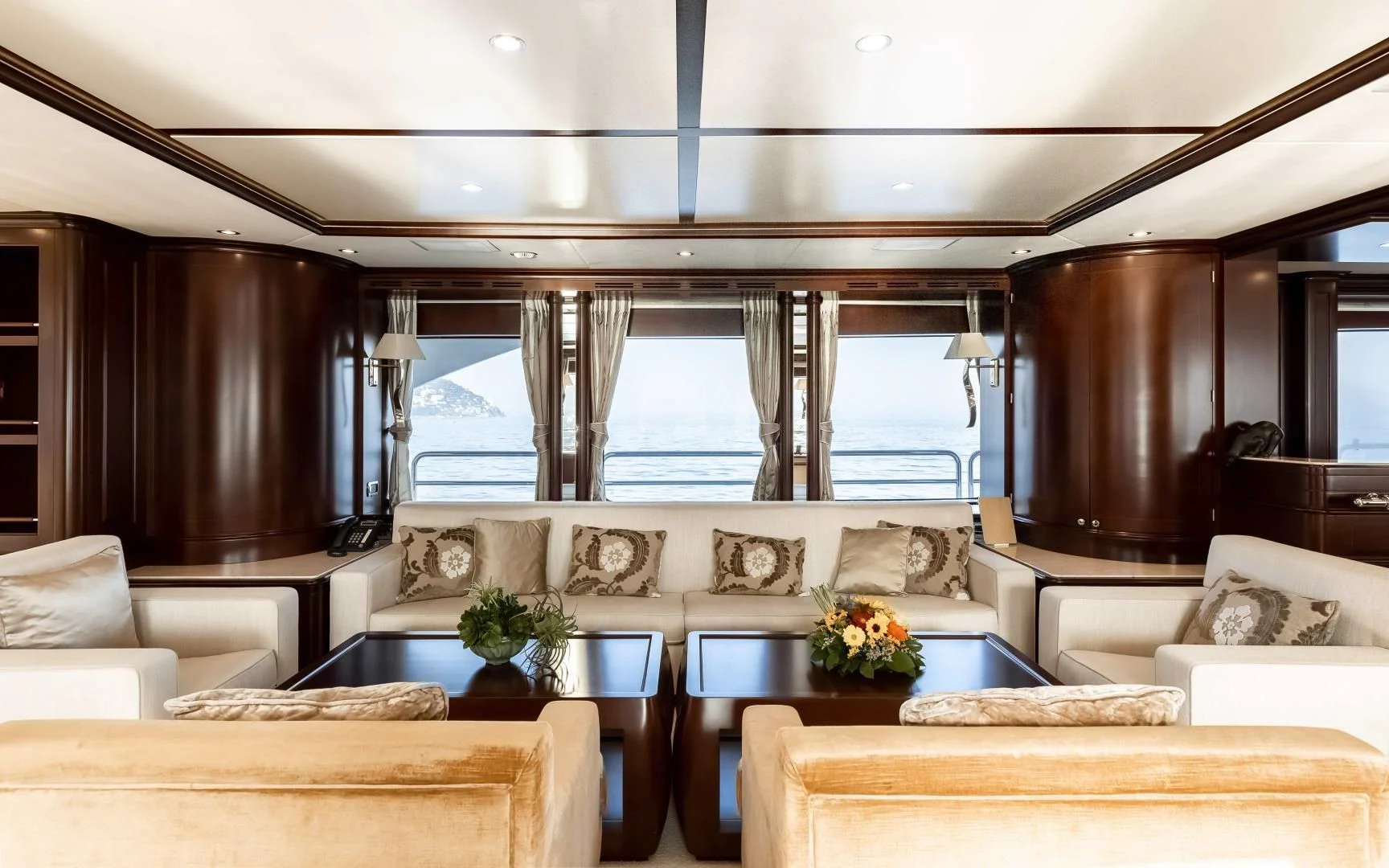 a living room with a large window aboard MI AMORE JULIA Yacht for Sale