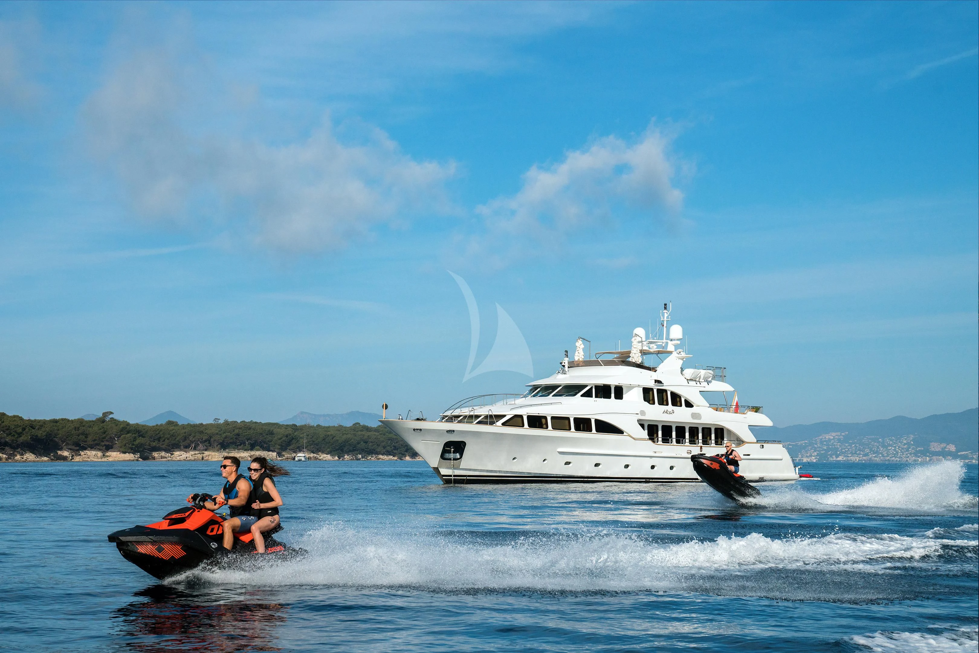 a couple of people on a boat in the water by a boat aboard MI AMORE JULIA Yacht for Sale