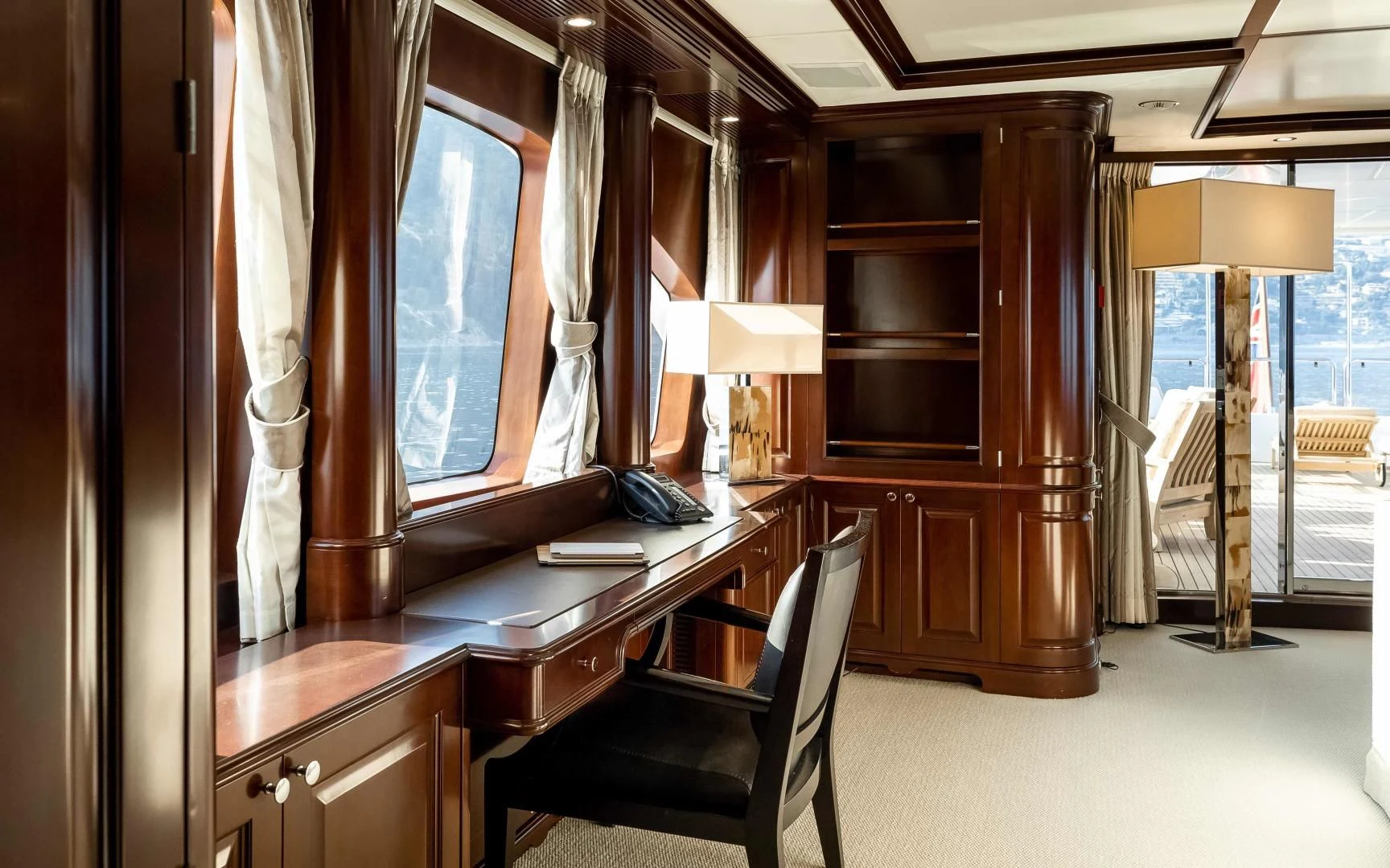 a room with a desk and a chair aboard MI AMORE JULIA Yacht for Sale