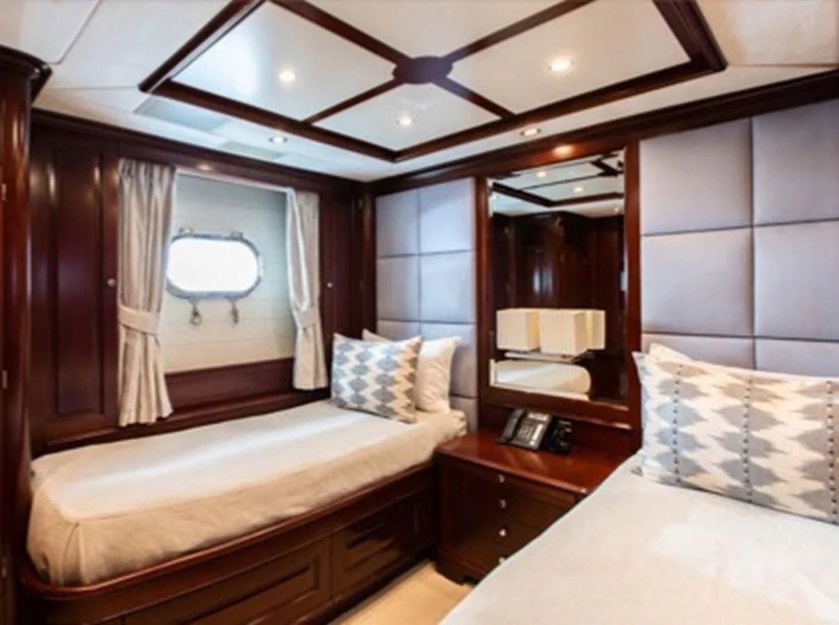 a room with two beds aboard MI AMORE JULIA Yacht for Sale