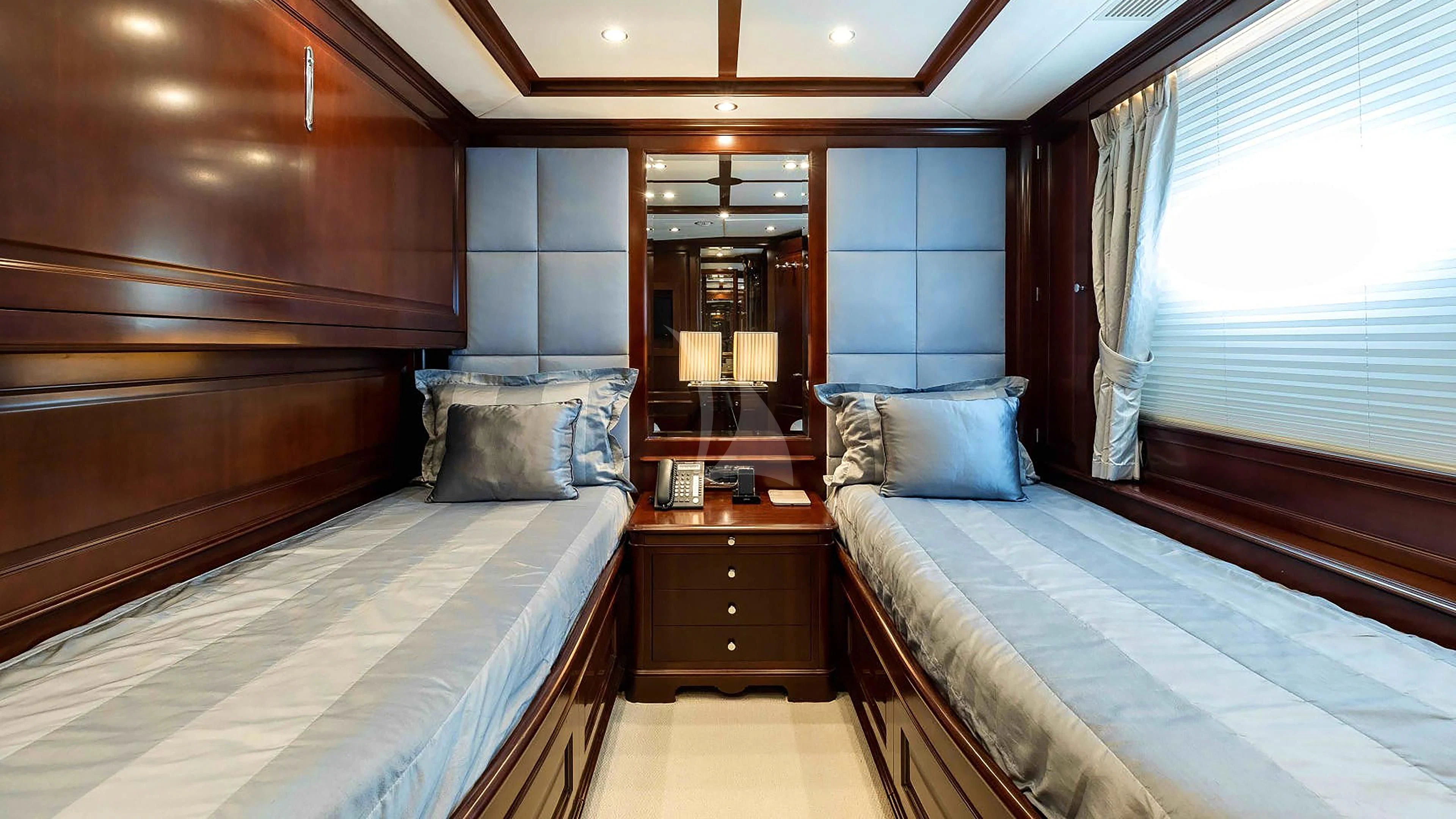 a room with two beds aboard MI AMORE JULIA Yacht for Sale