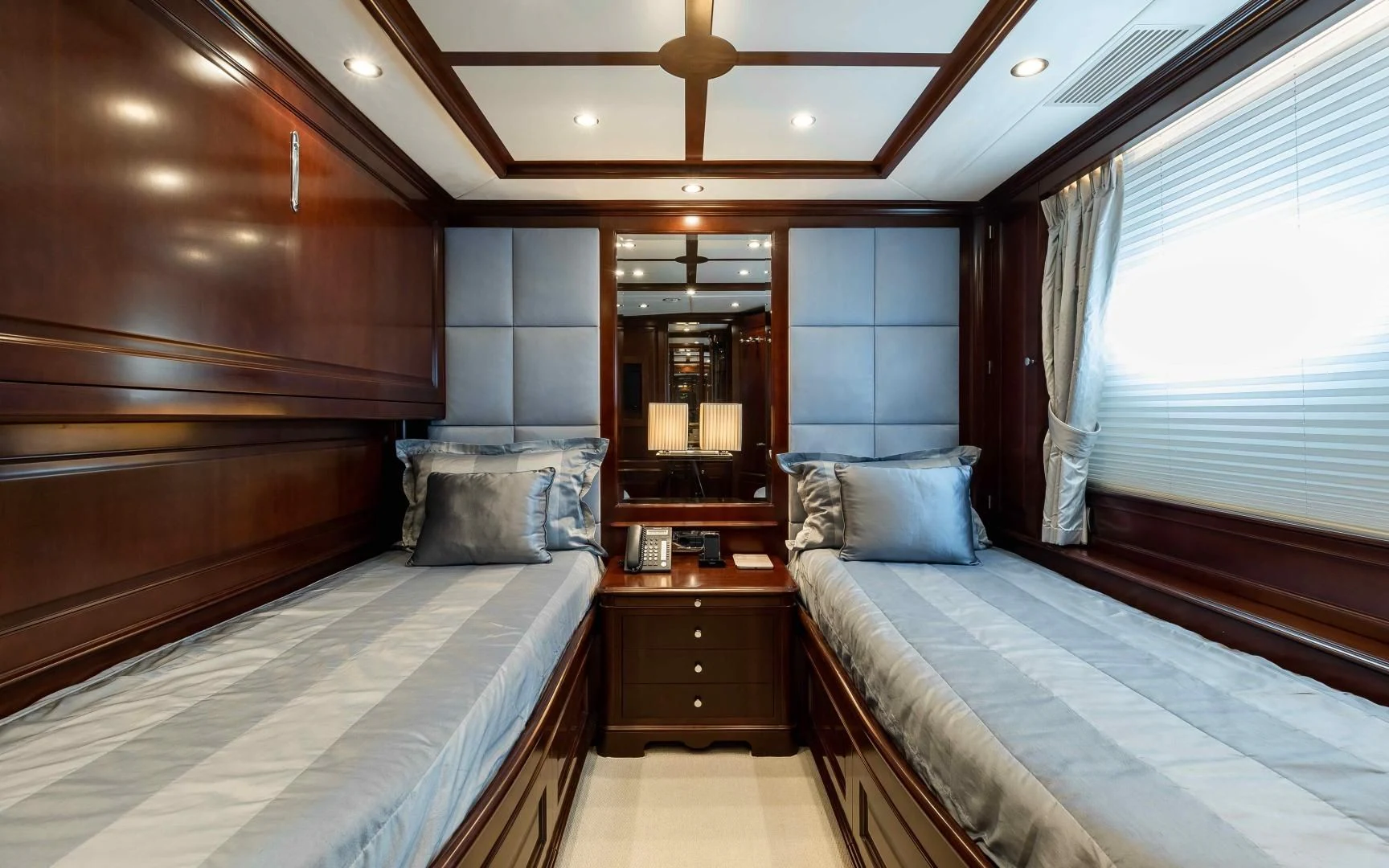 a room with a bed and a desk aboard MI AMORE JULIA Yacht for Sale