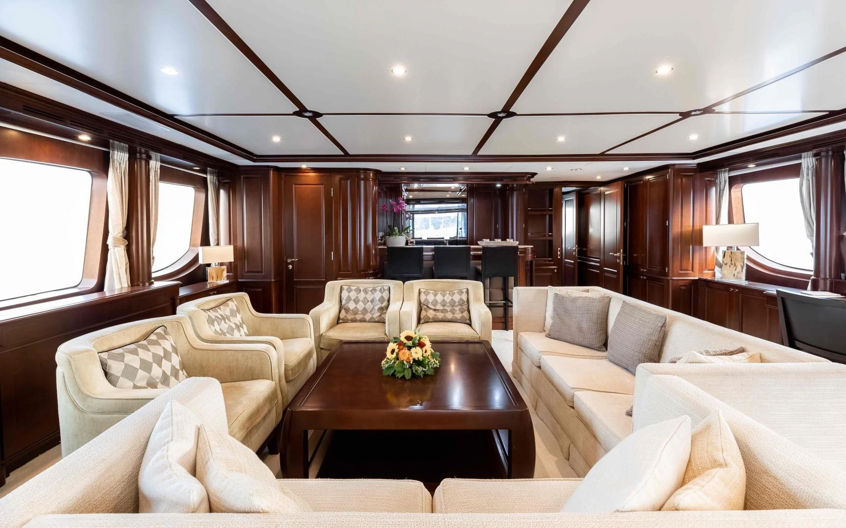a living room with couches and a table aboard MI AMORE JULIA Yacht for Sale