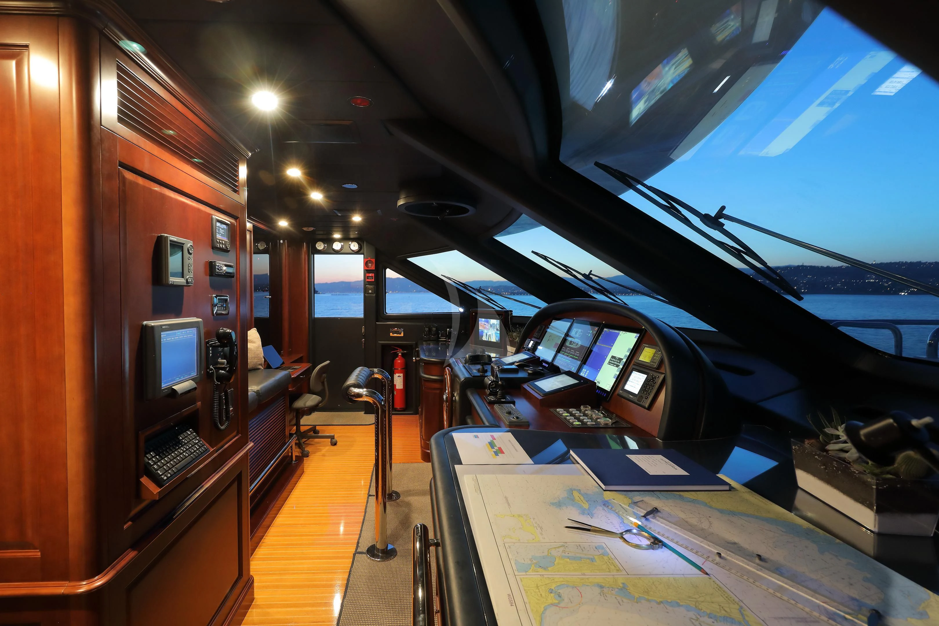 inside of a vehicle with a screen and a laptop on the floor aboard MI AMORE JULIA Yacht for Sale