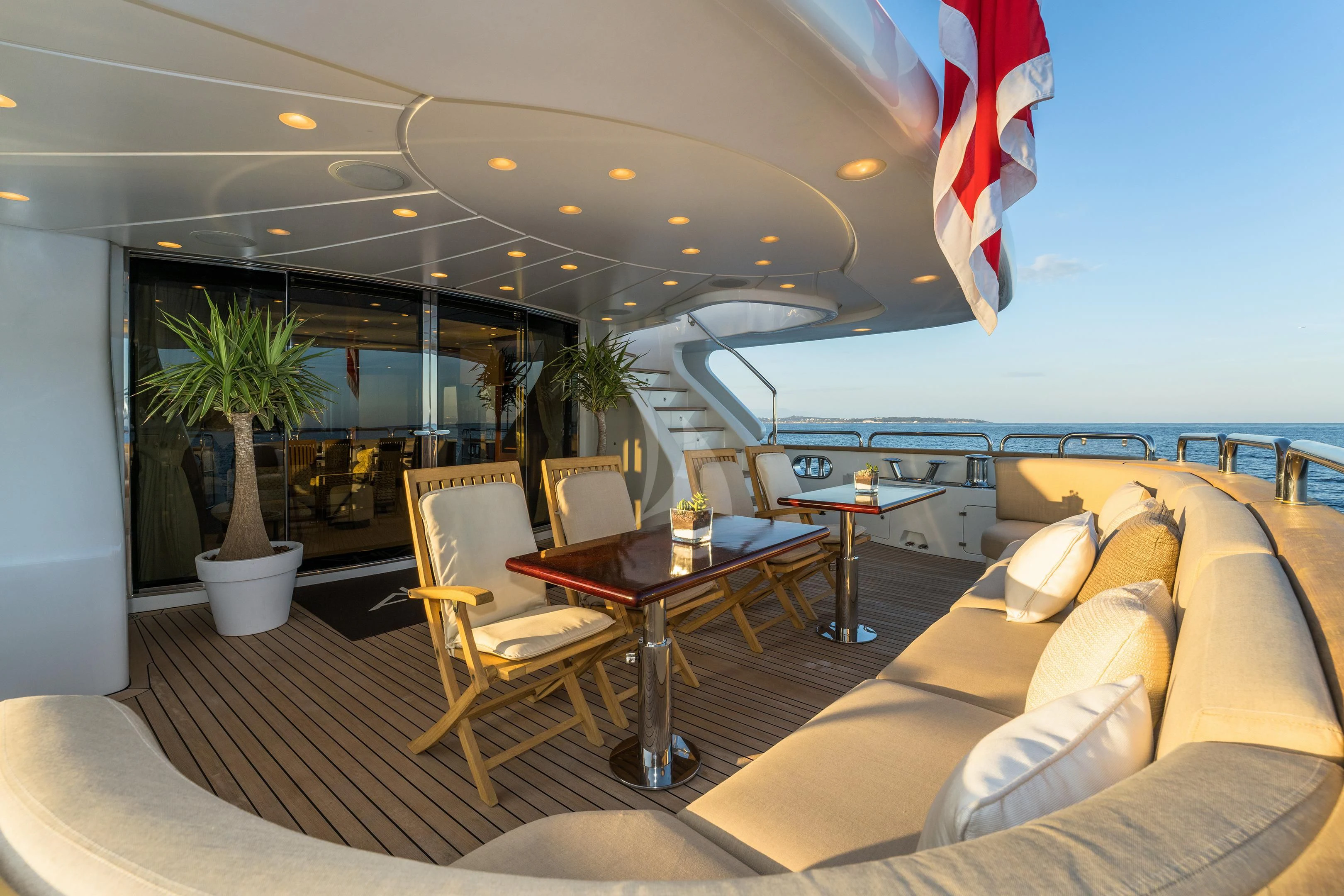 a room with a table and chairs aboard MI AMORE JULIA Yacht for Sale