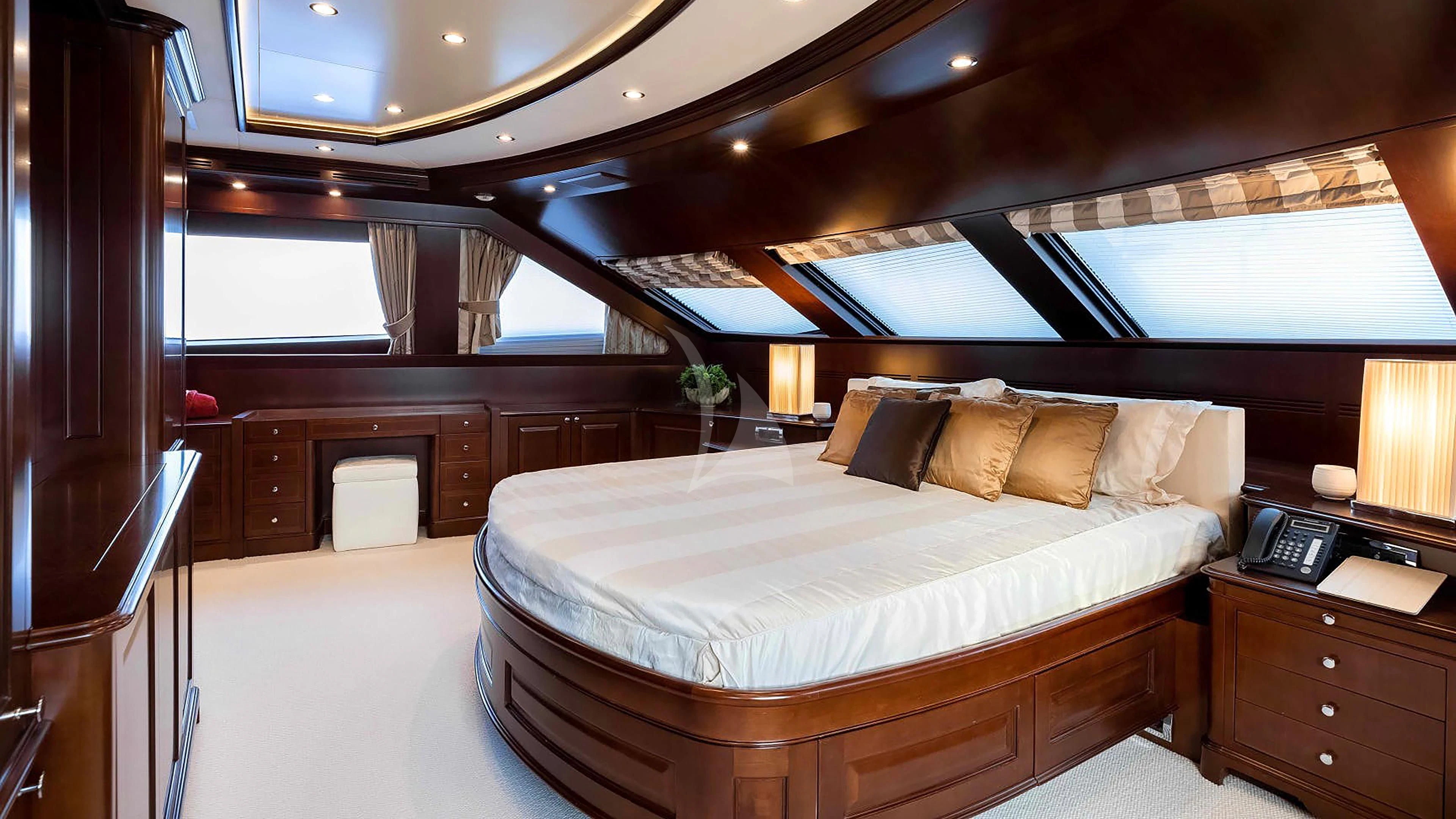 a bed in a room aboard MI AMORE JULIA Yacht for Sale