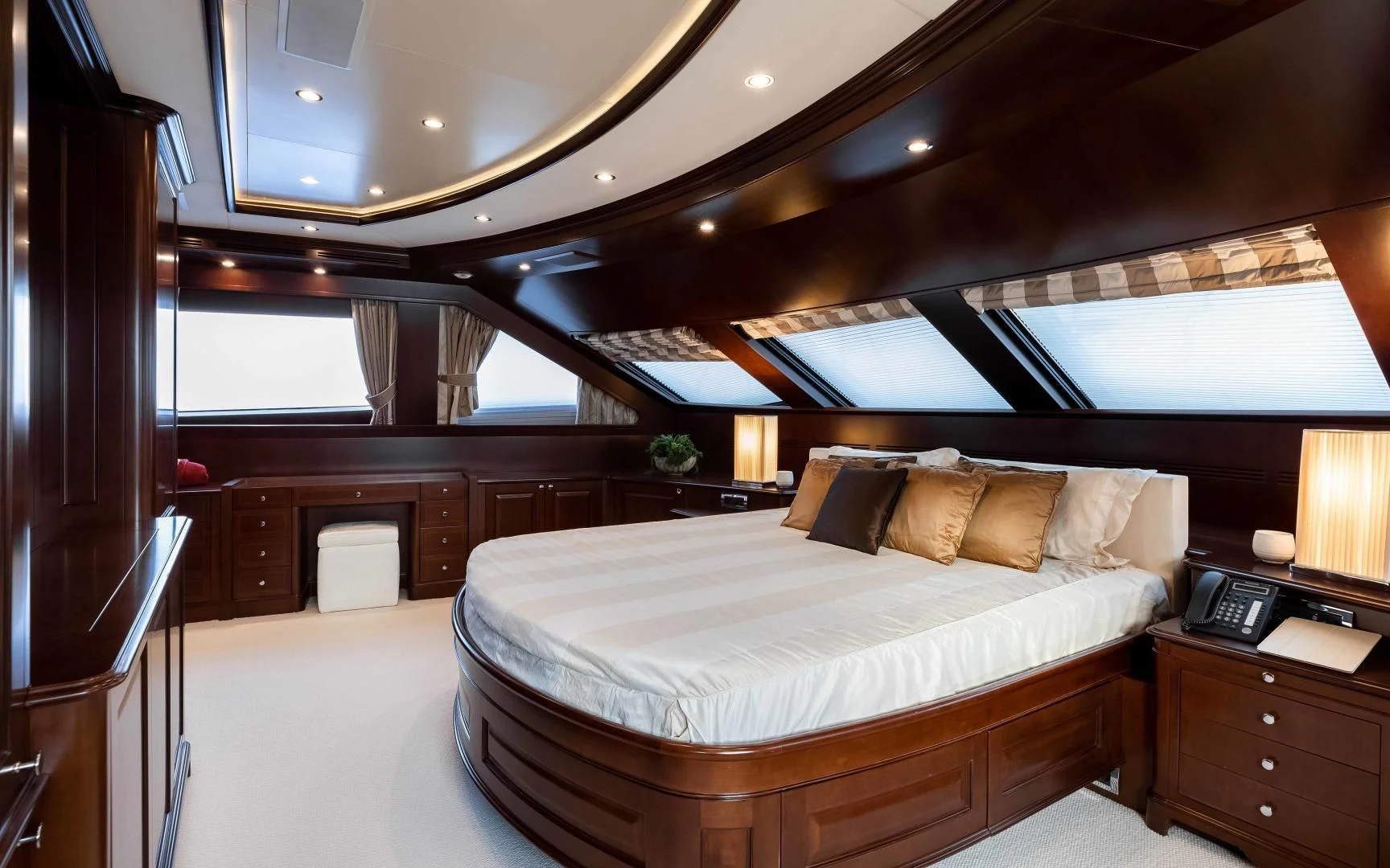 a large bed in a room aboard MI AMORE JULIA Yacht for Sale