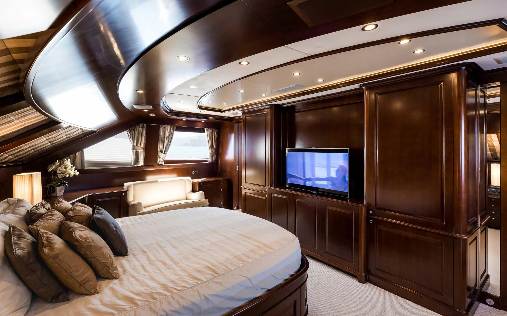 a bedroom with a large bed aboard MI AMORE JULIA Yacht for Sale