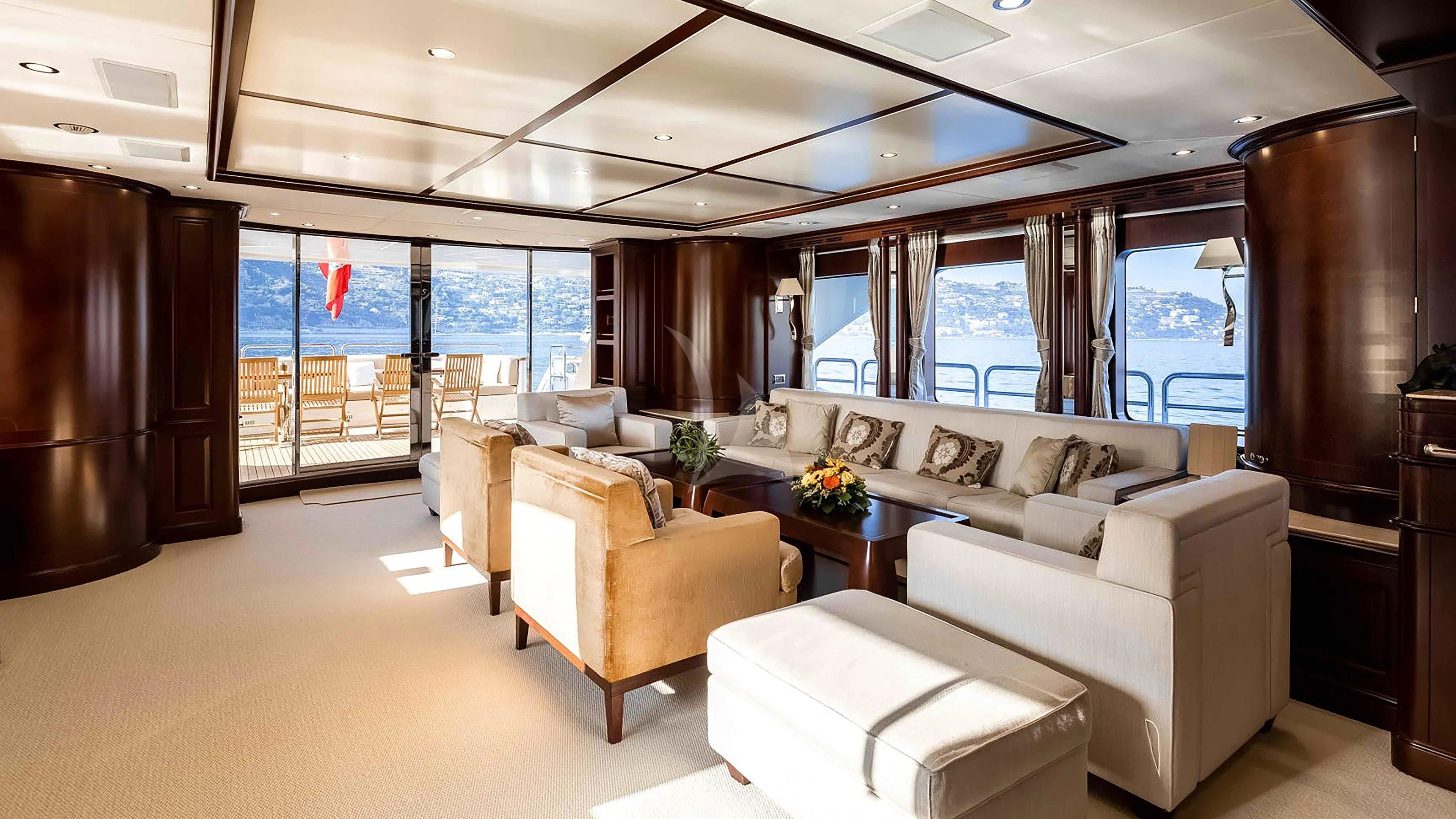 a living room with a couch and a table aboard MI AMORE JULIA Yacht for Sale