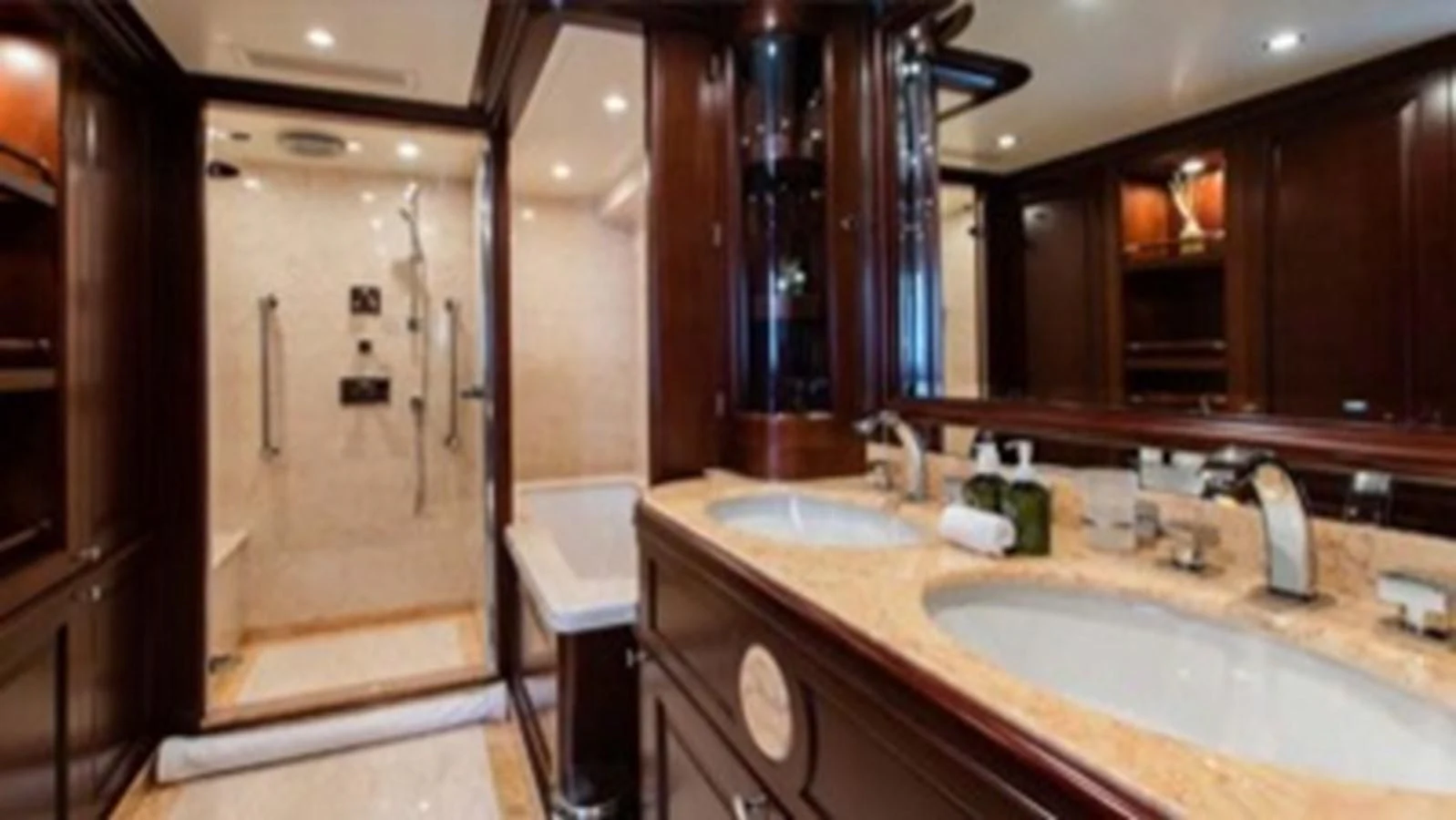 a bathroom with a glass shower aboard MI AMORE JULIA Yacht for Sale