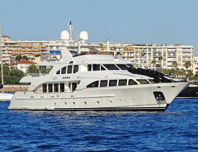 a large white boat in the water aboard MI AMORE JULIA Yacht for Sale