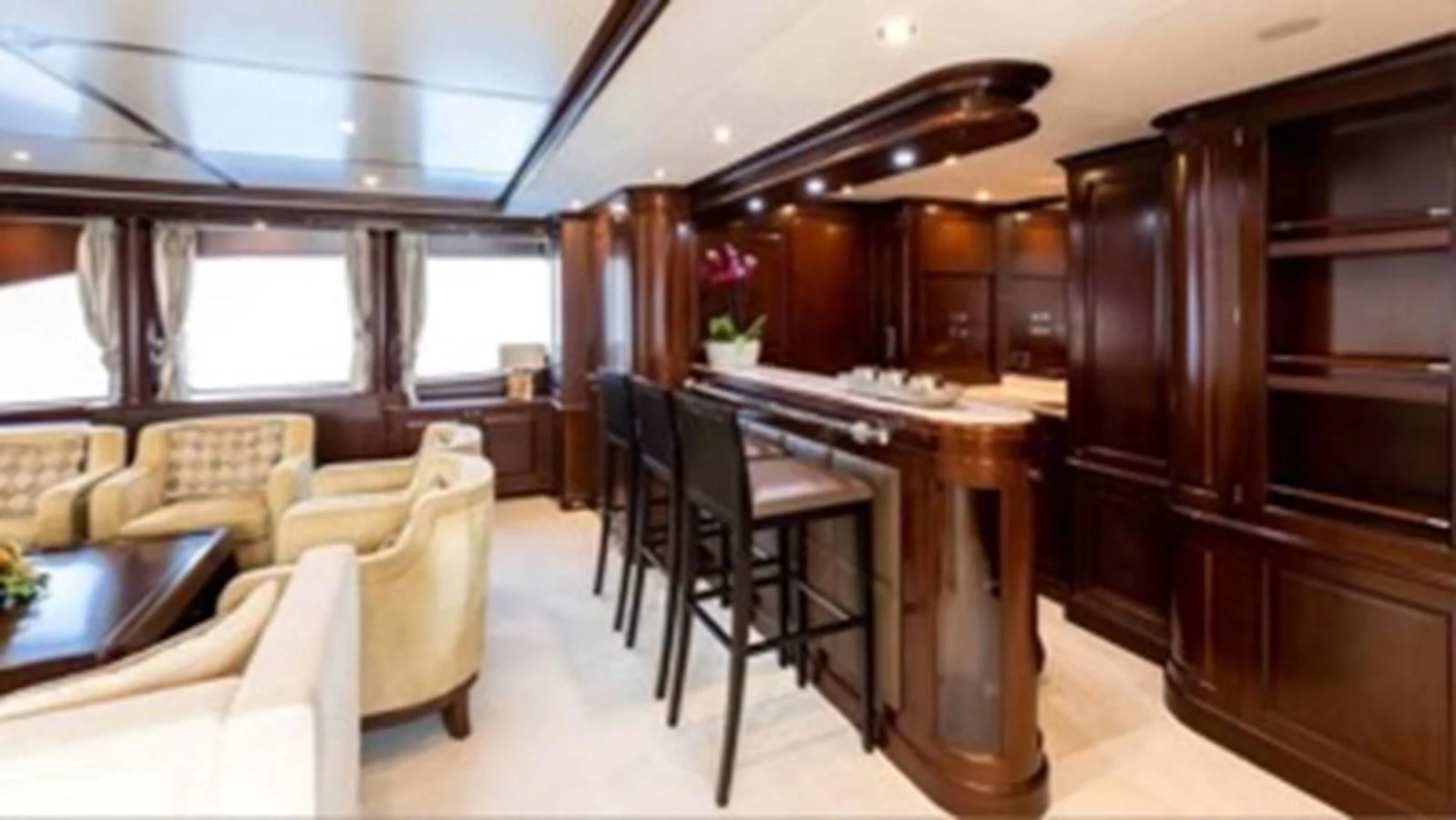 a room with a table chairs and a piano aboard MI AMORE JULIA Yacht for Sale
