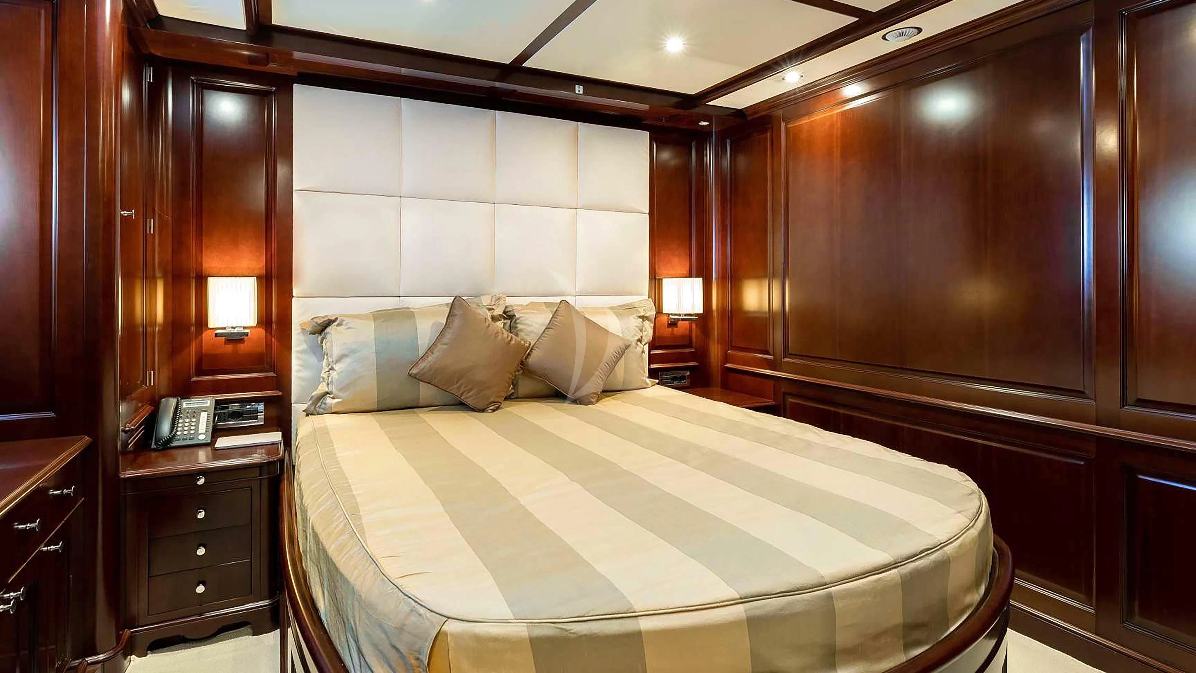 a bed in a room aboard MI AMORE JULIA Yacht for Sale