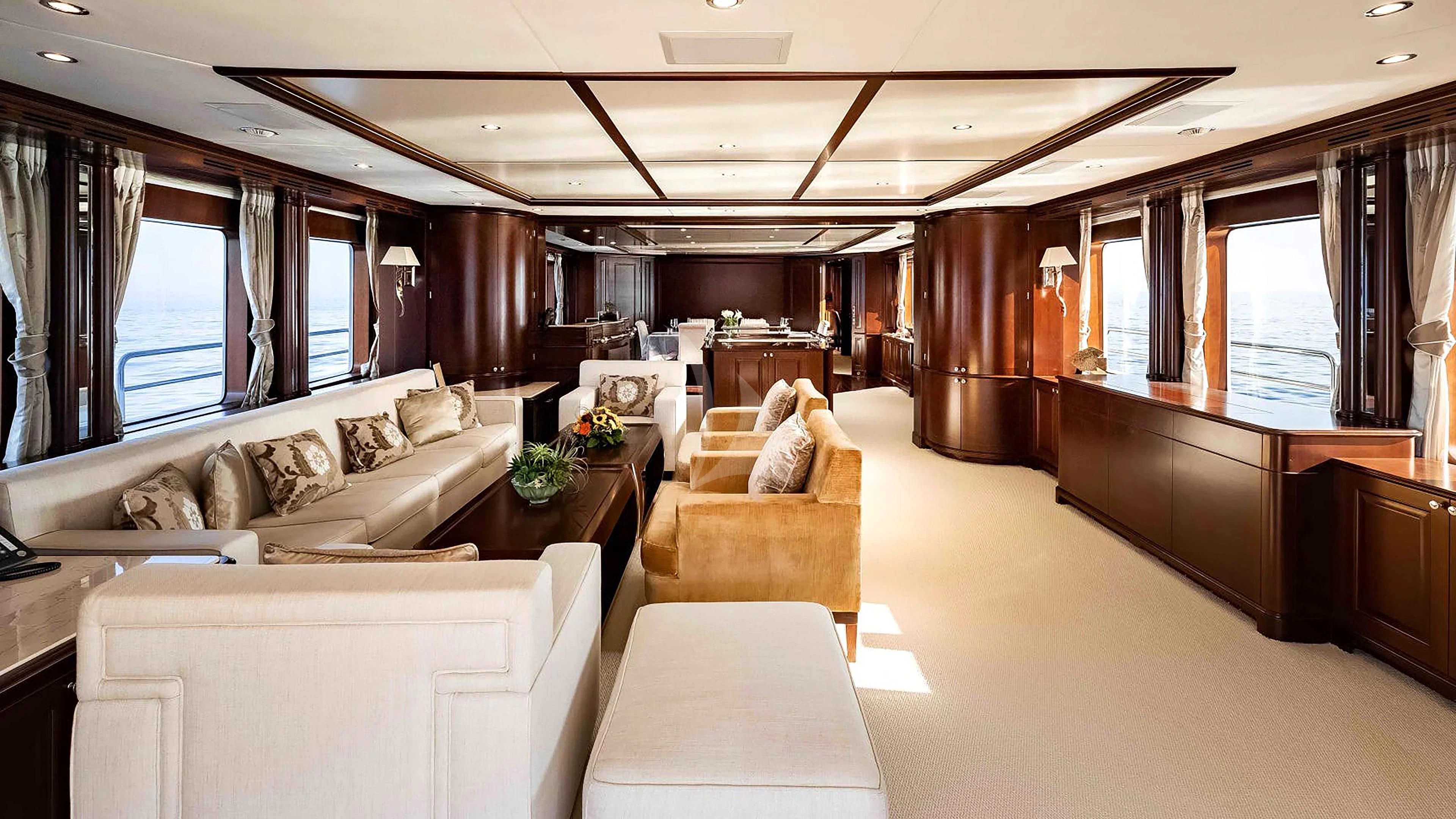 a living room with a couch and a table aboard MI AMORE JULIA Yacht for Sale