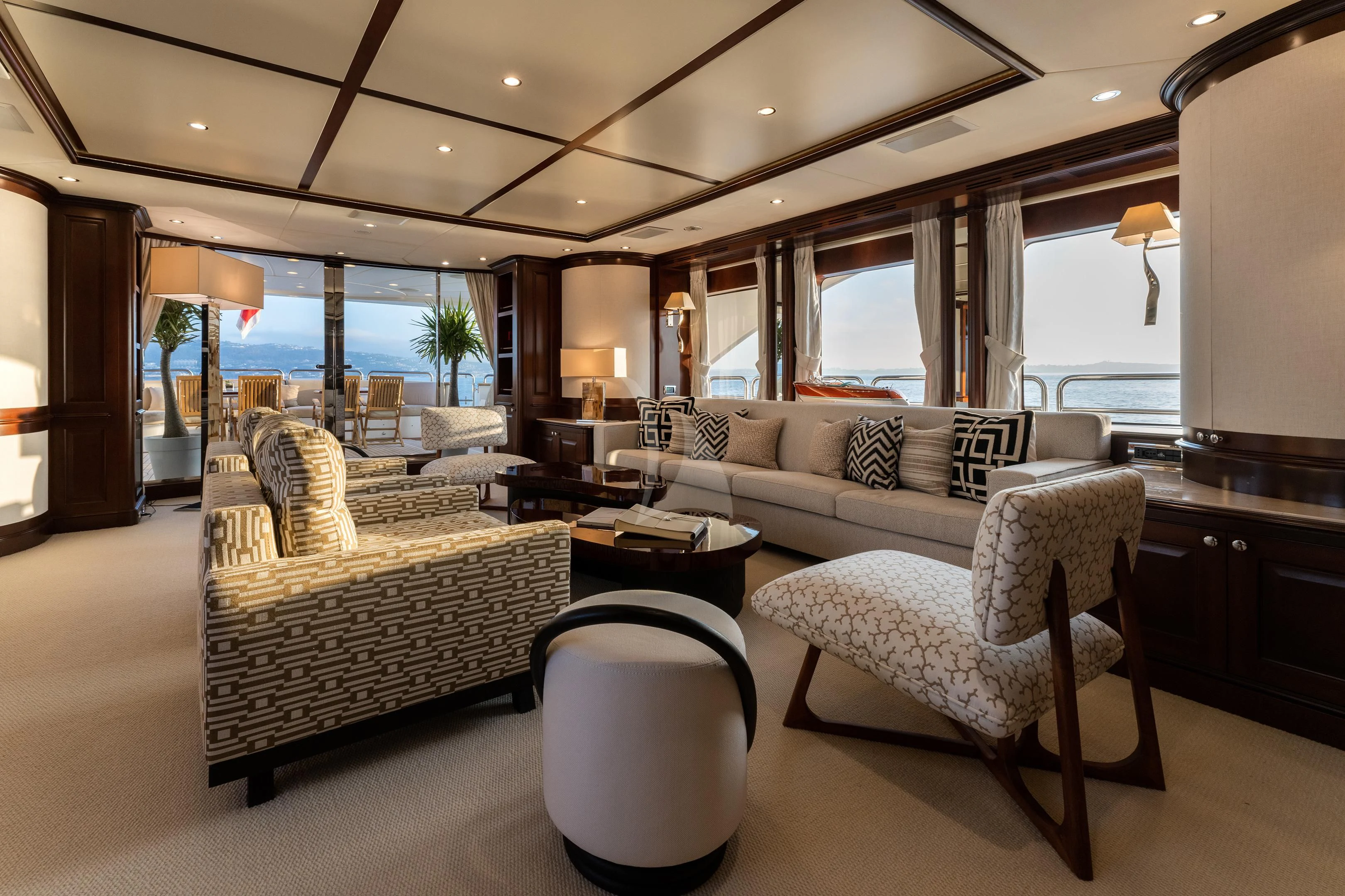 a living room with a couch and a coffee table aboard MI AMORE JULIA Yacht for Sale